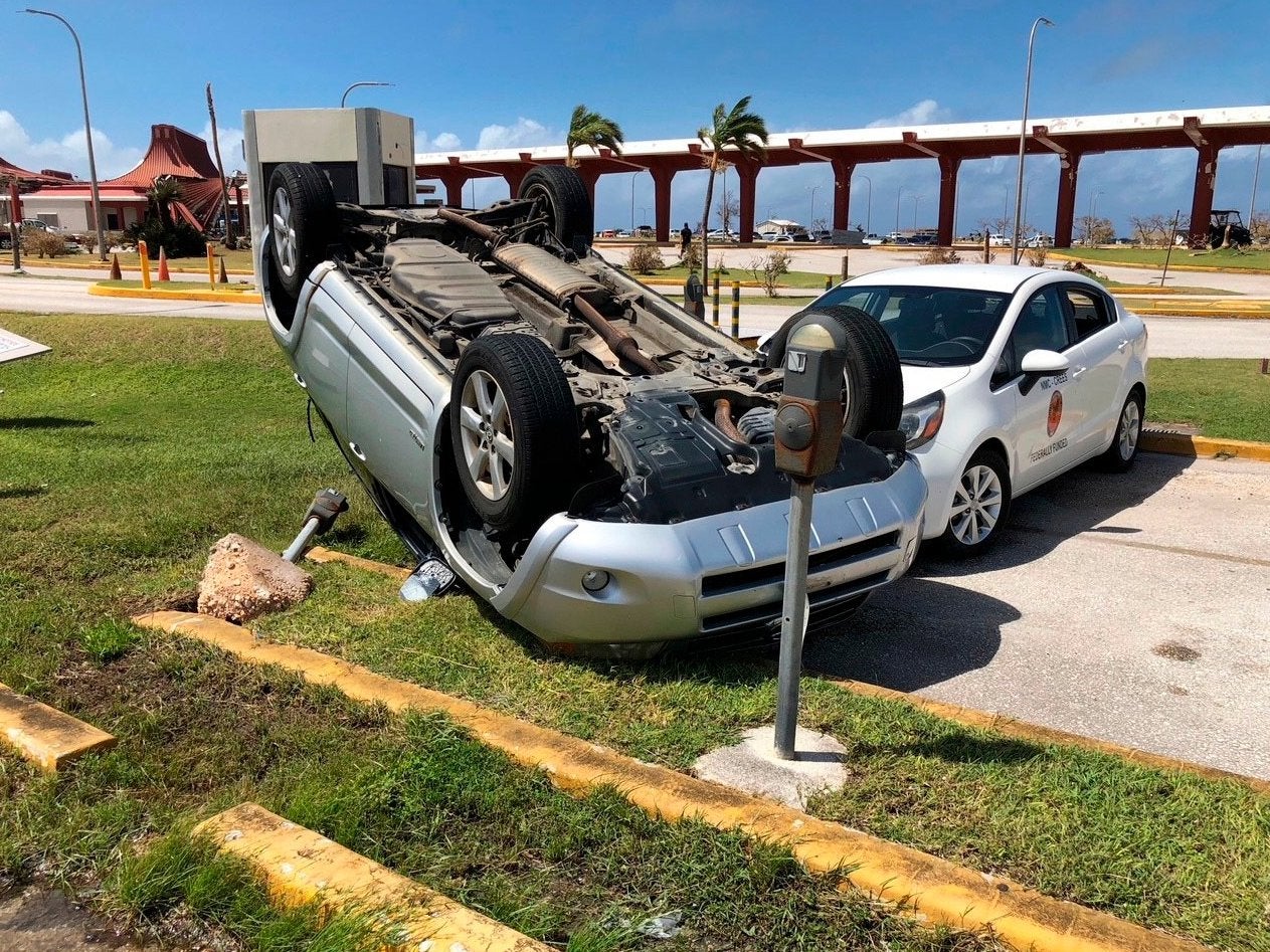 An overturned car at the Northern Mariana Islands’ airport