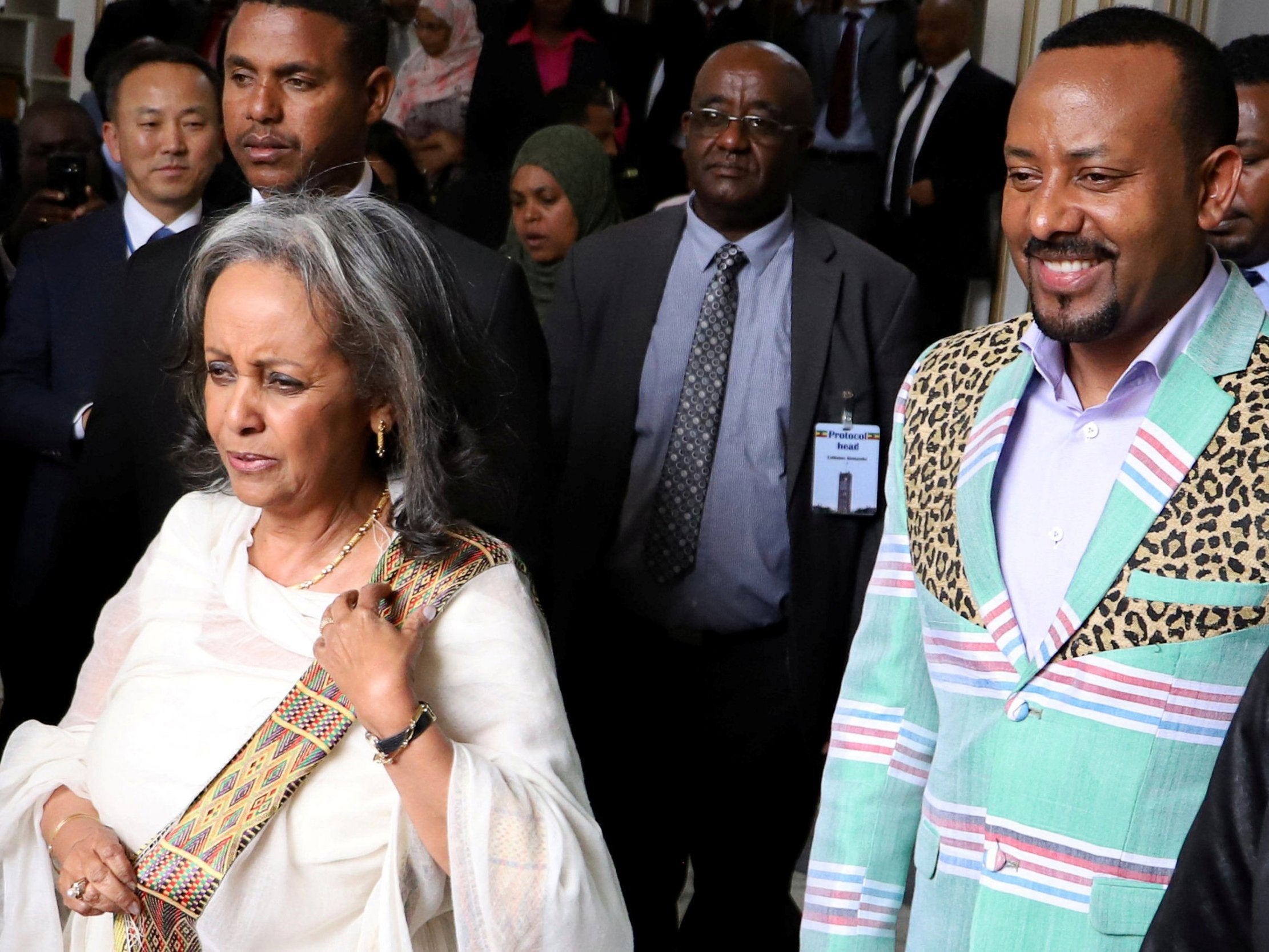 Ethiopia's Prime Minister Abiy Ahmed with the newly elected President Sahle-Work Zewde, as they leave House of Peoples' Representatives in Addis Ababa, Ethiopia, 25 October 2018. (Tiksa Negeri