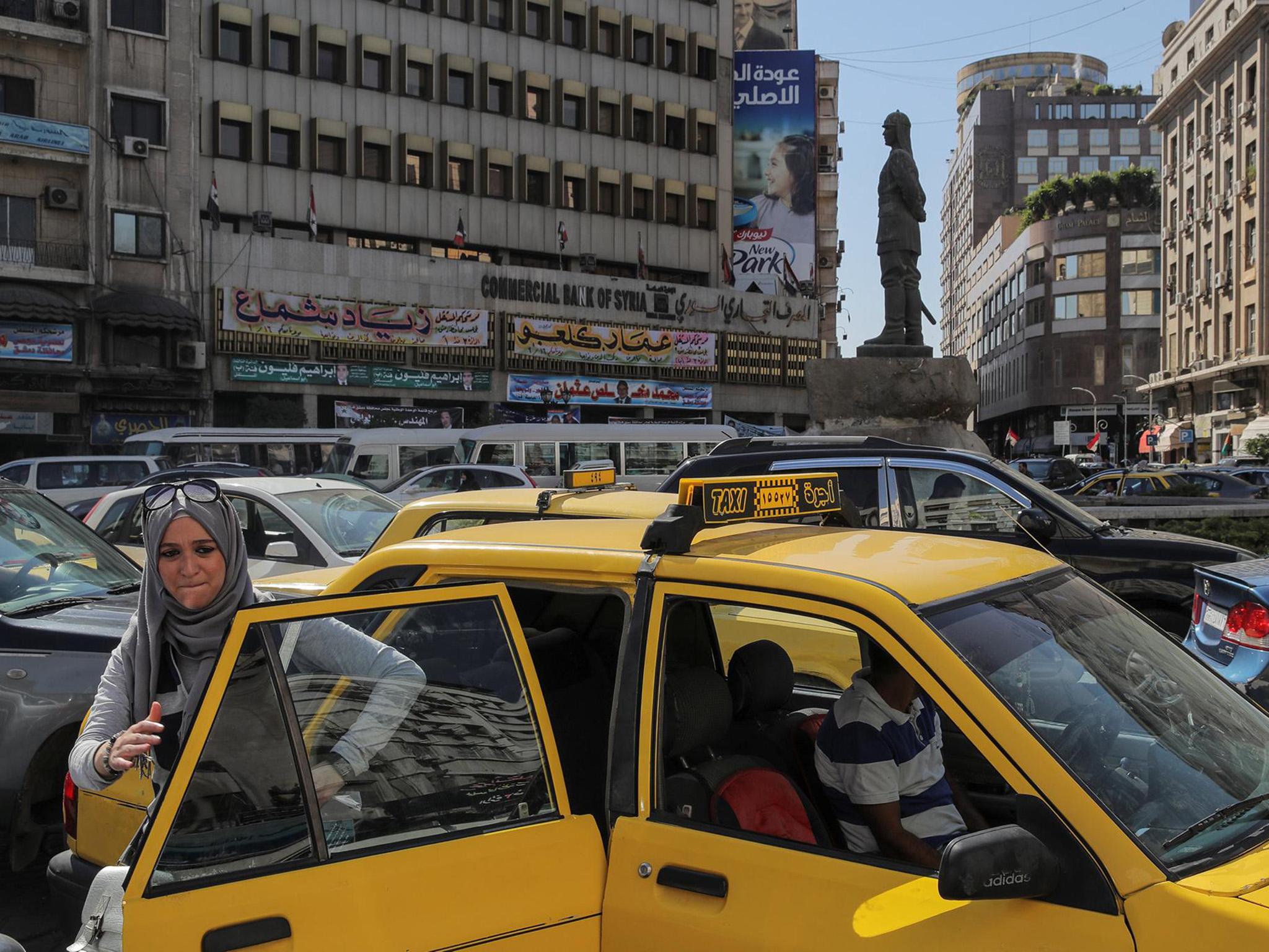 Rush hour in central Damascus sees the city just like any other