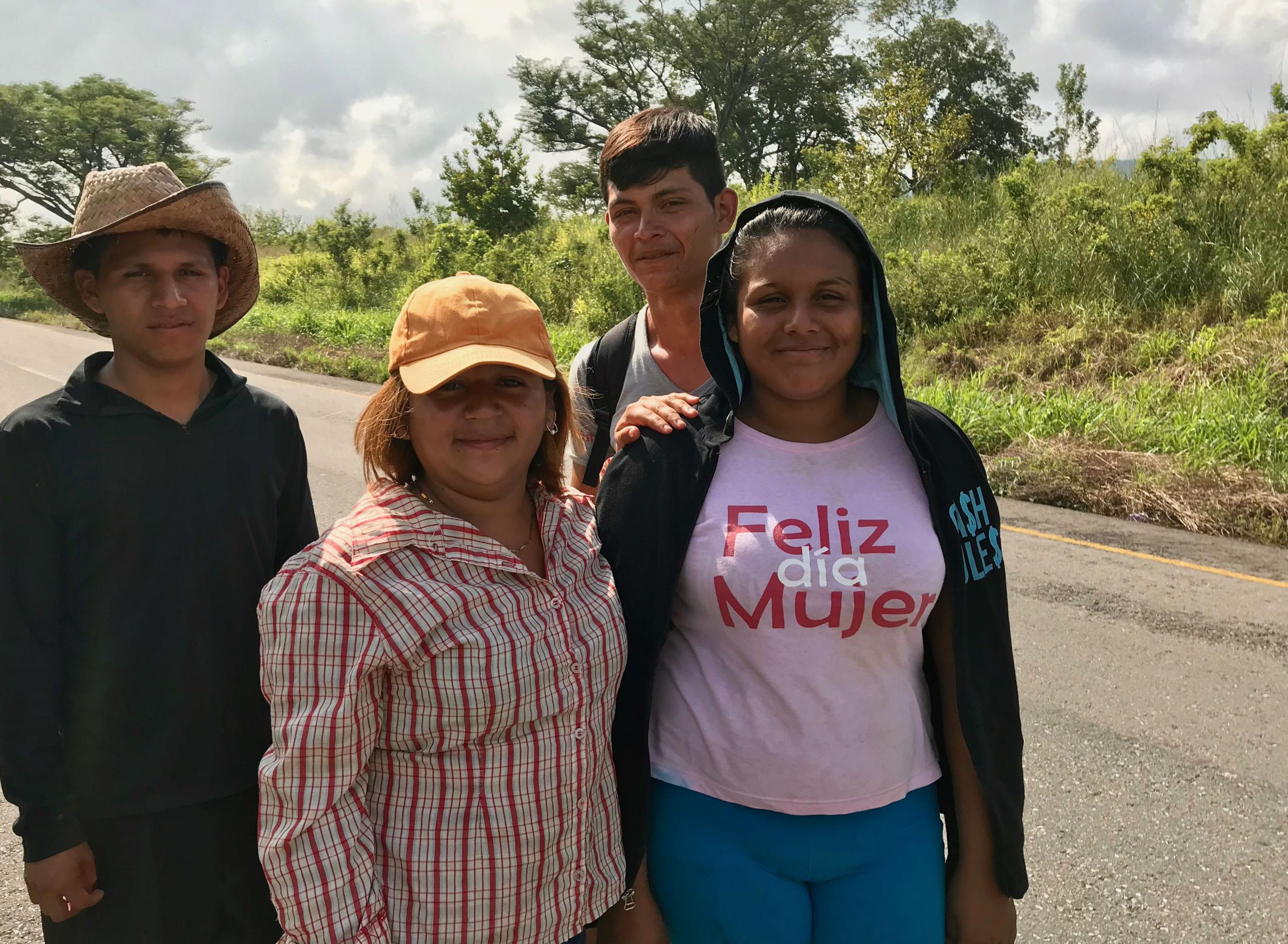 &#13;
Yonsi Marilu, here in yellow baseball cap, hopes to start a new life in the US &#13;