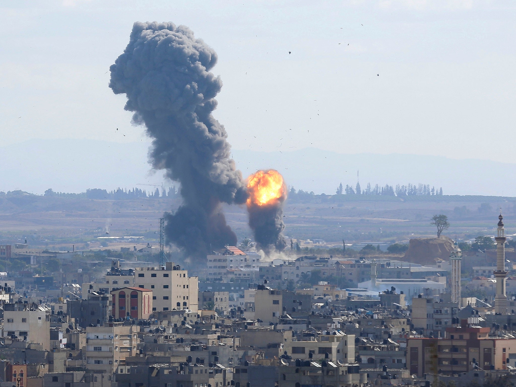 Smoke rises from an explosion caused by an Israeli airstrike in Gaza City on 27 October