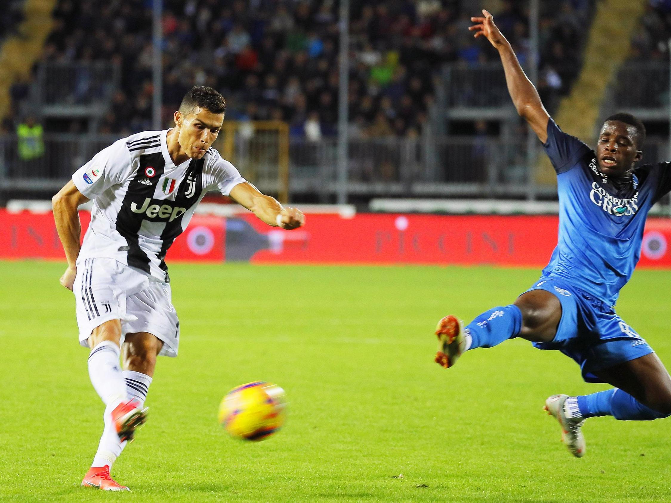 Cristiano Ronaldo powers the ball into the top corner