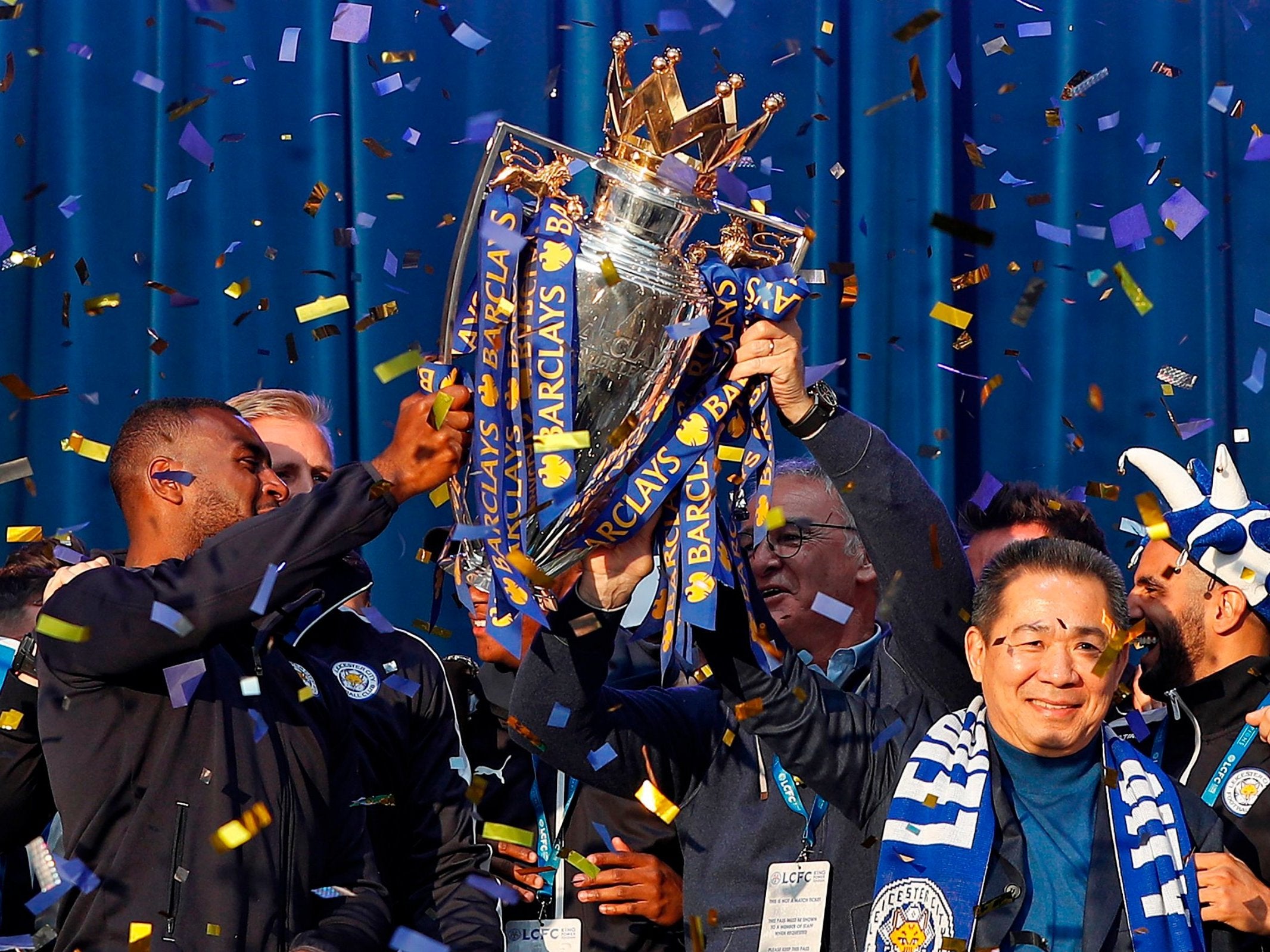 In this photo taken on 16 May 2016, Srivaddhanaprabha holds up the Premier League trophy to fans as the Leicester City team celebrated in Victoria Park