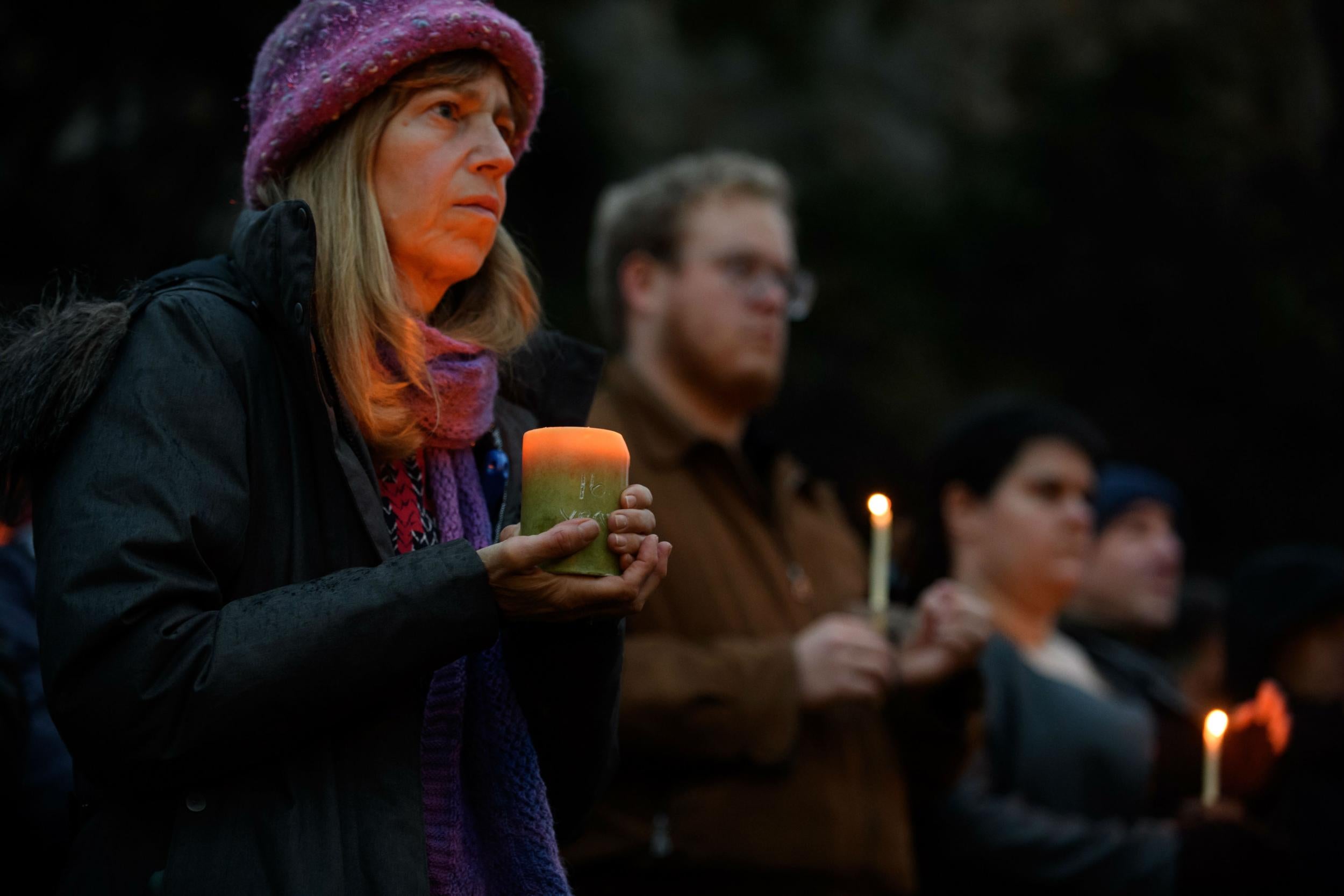 Mourners pay tribute to the victims