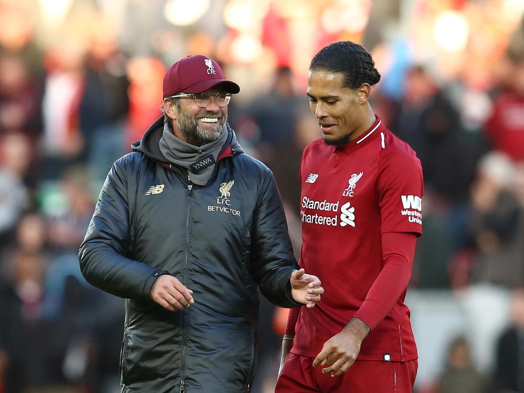 Jurgen Klopp with Virgil van Dijk after the victory over Cardiff