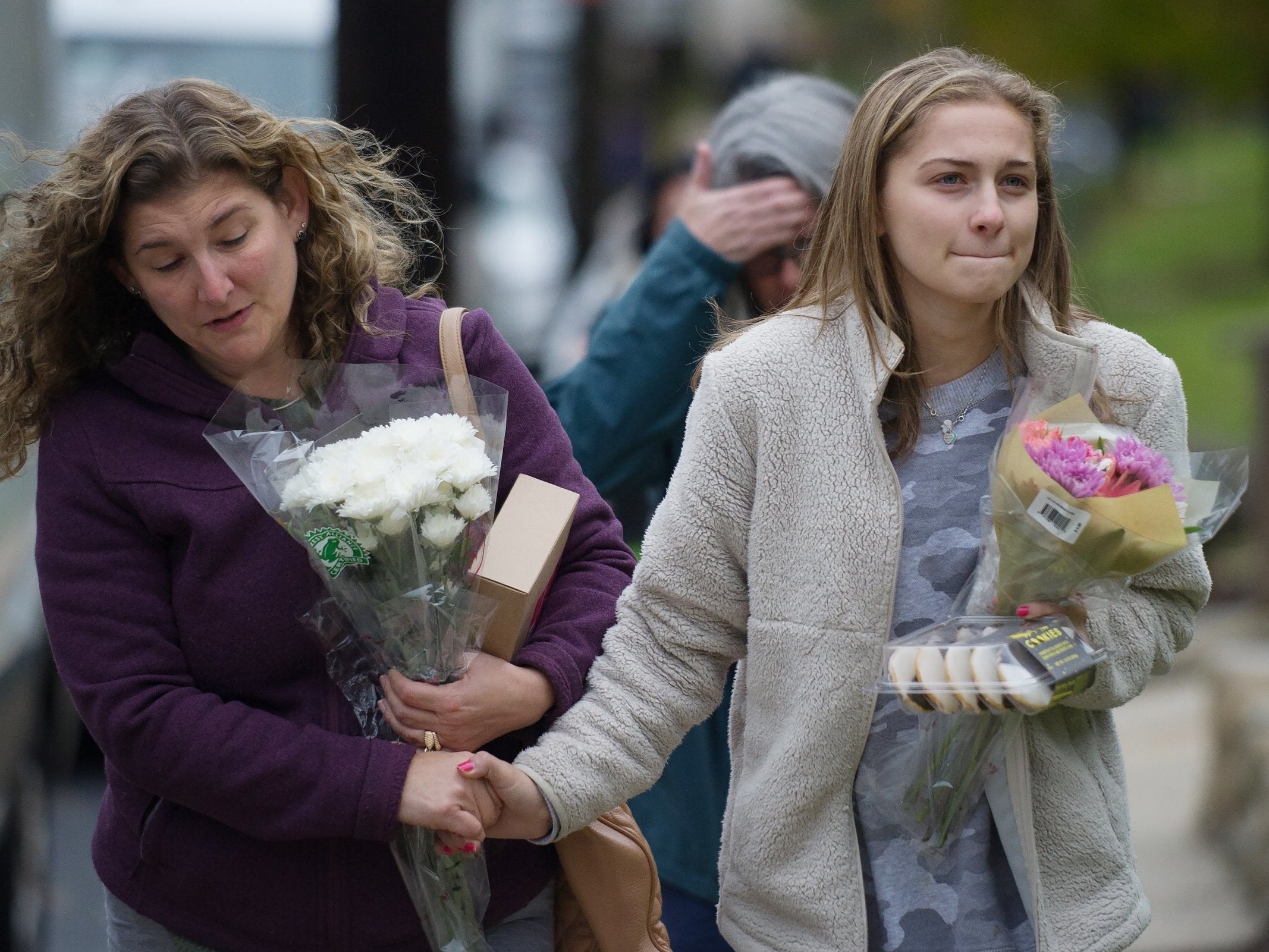 Mourners outside the Tree of Life synagogue