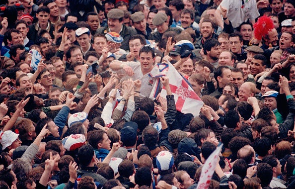 Carling was carried from the pitch by fans after England's Five Nations victory in 1991