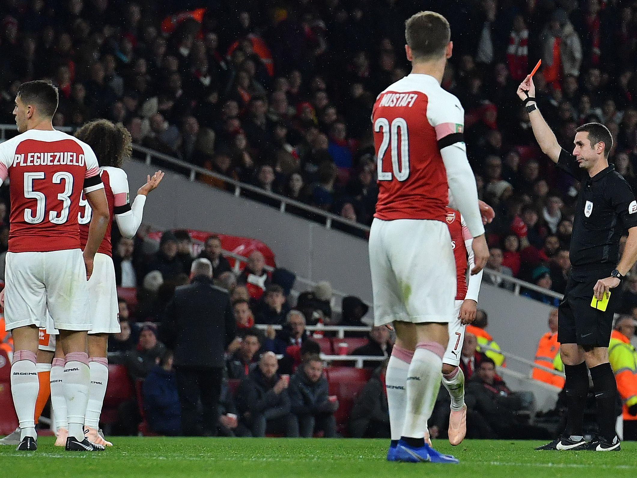 Matteo Guendouzi is shown red for two yellow cards