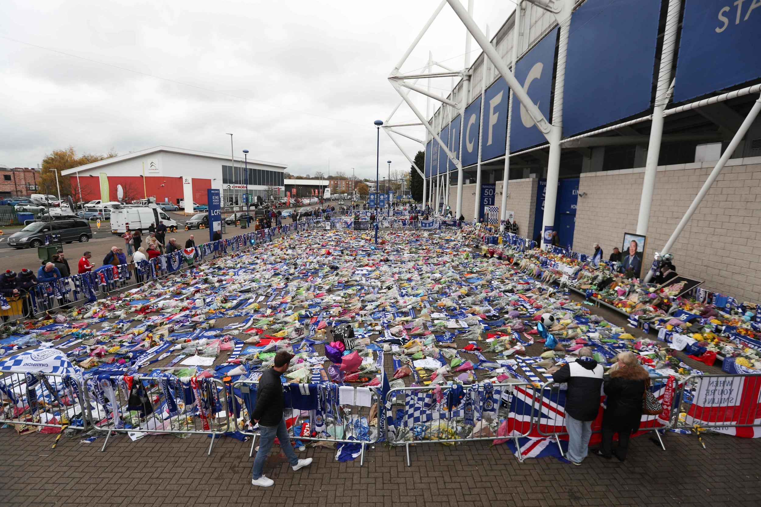 Dozens of tributes have been laid outside the King Power Stadium