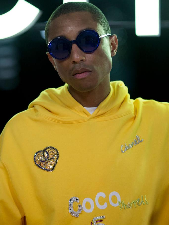 The musician wore a yellow hoodie which was later revealed to be part of the new collection (Getty)