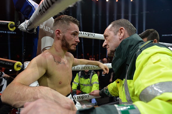 Ryan Burnett retired after the fourth round with a back injury