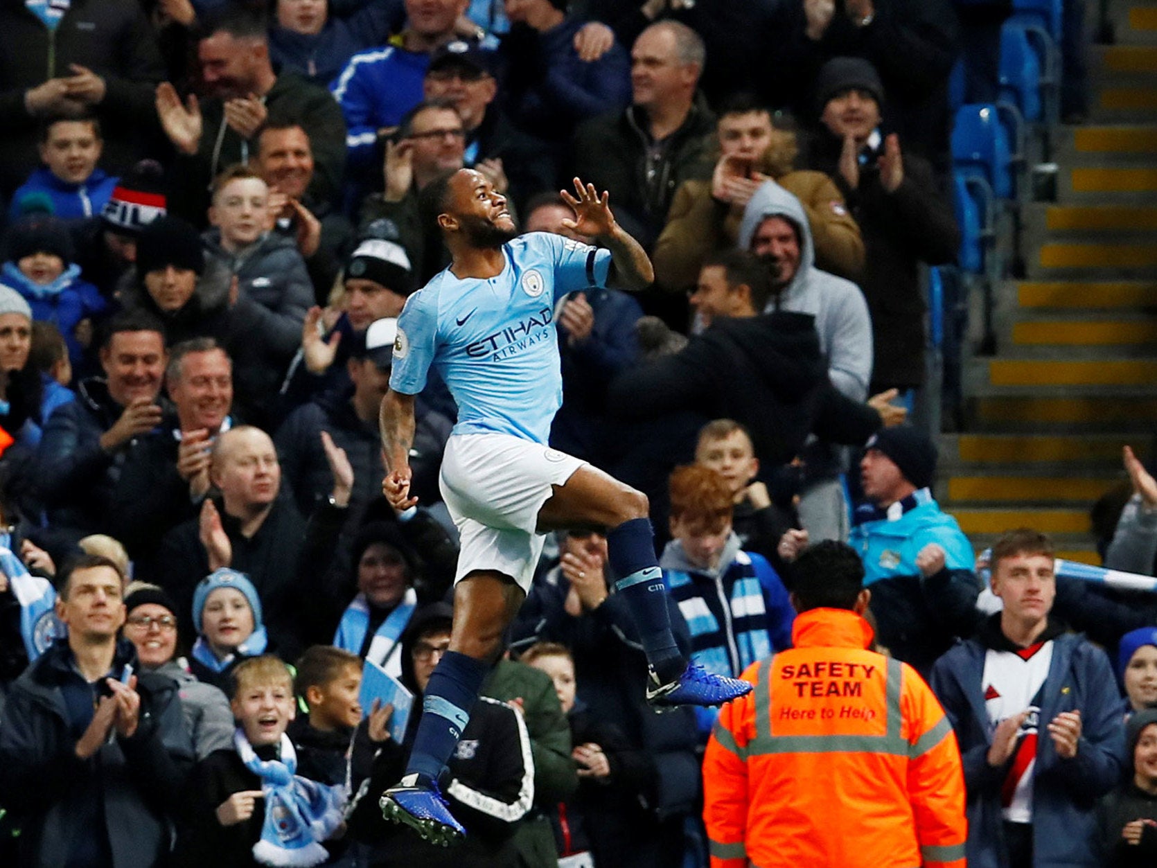 Raheem Sterling punches the air after scoring his second goal for Manchester City