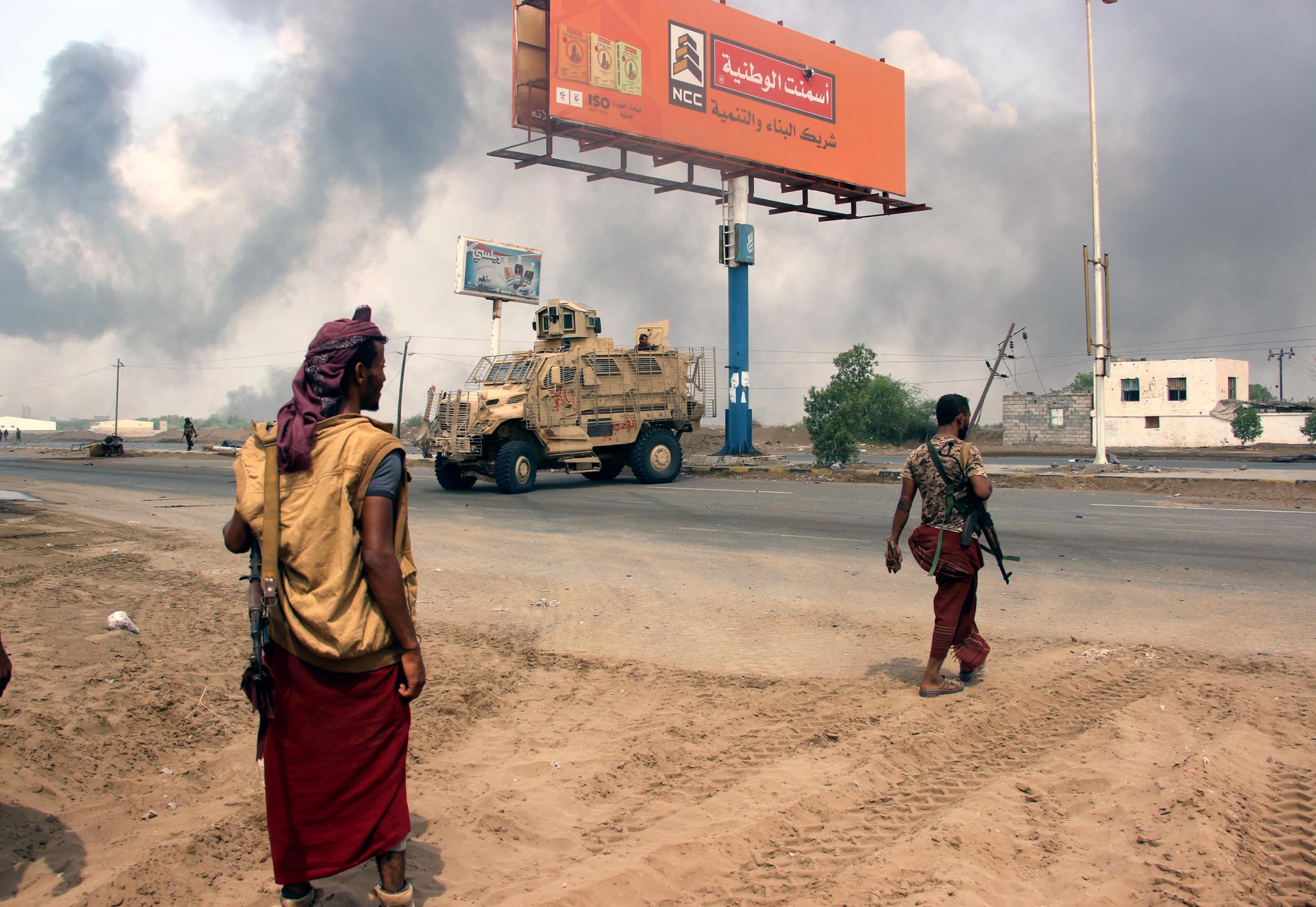 Yemeni government forces patrol near the port city of Hodeidah, Yemen, ahead of an offensive