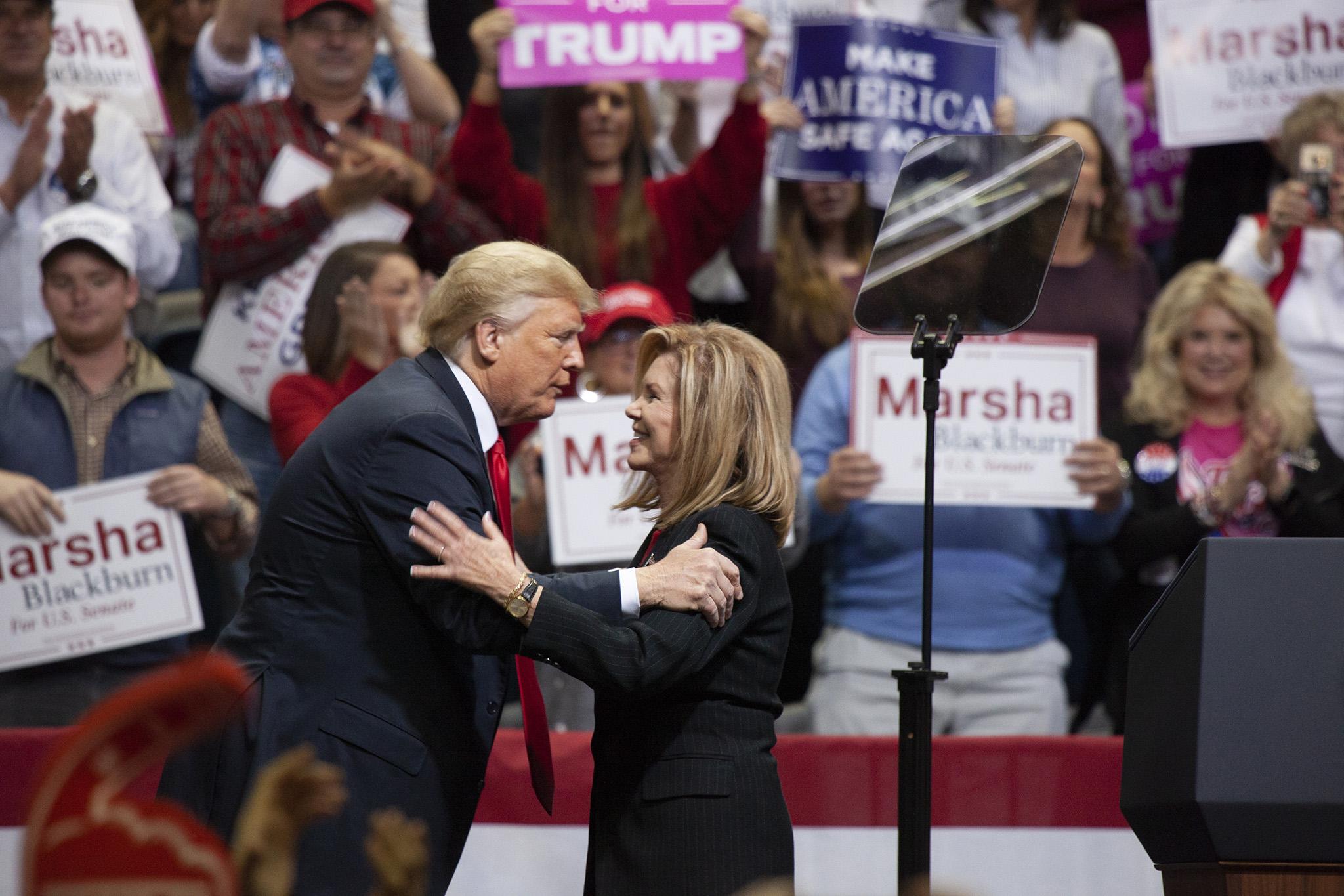 President Donald Trump appears with then-Senate candidate Marsha Blackburn at a MAGA rally in Chattanooga, Tennessee, in November 2018