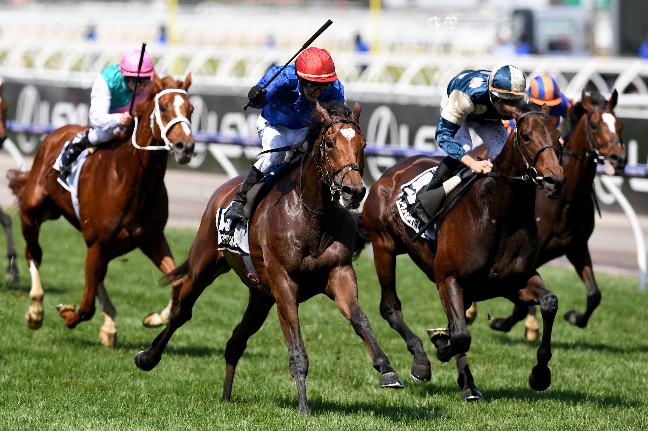 Kerrin McEvoy celebrates as he rides Cross Counter to victory