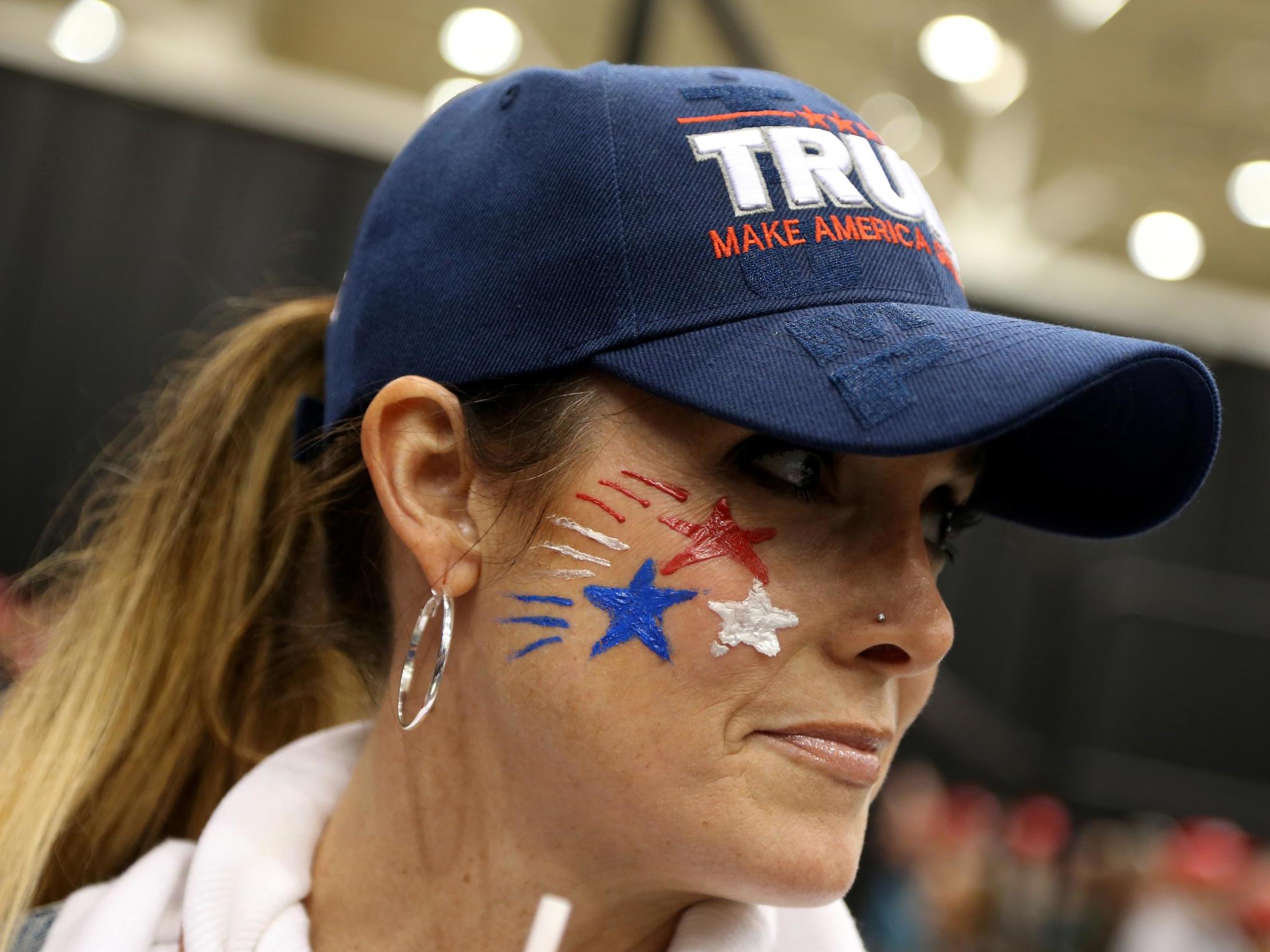 A supporter of US President Donald Trump attends his rally in support of Ohio Republican candidates