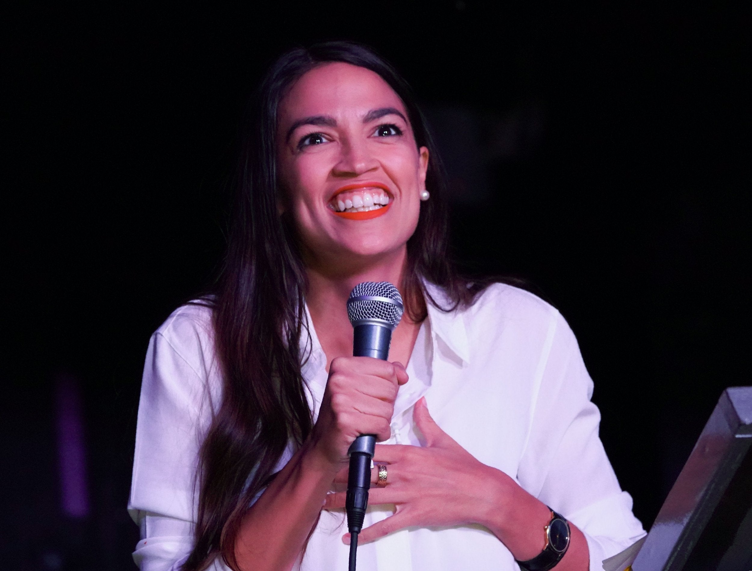 Alexandria Ocasio-Cortez speaks to her supporters during her election night party in the Queens Borough of New York