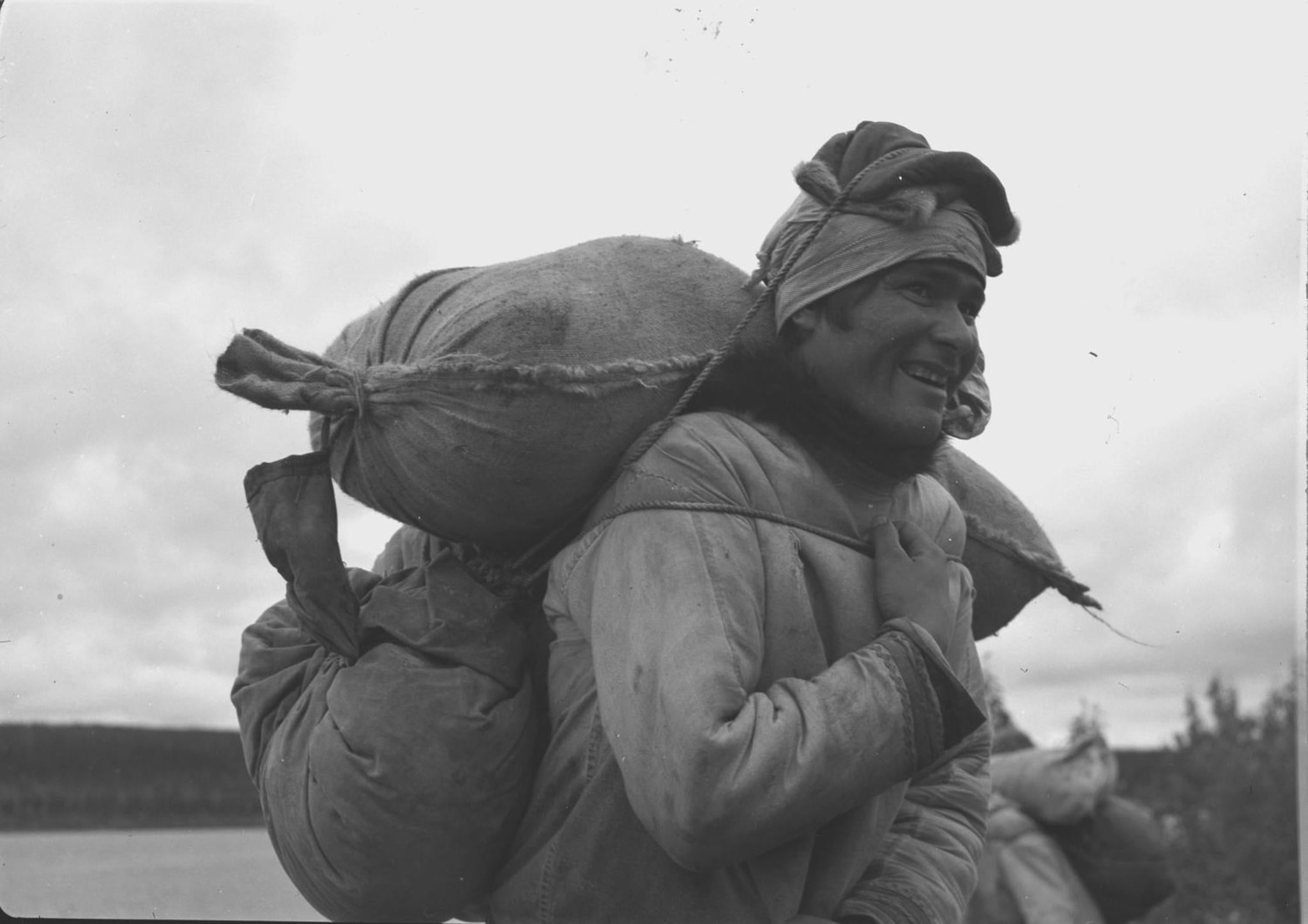 Naskapi Joseph Sandy transports materials in 1941