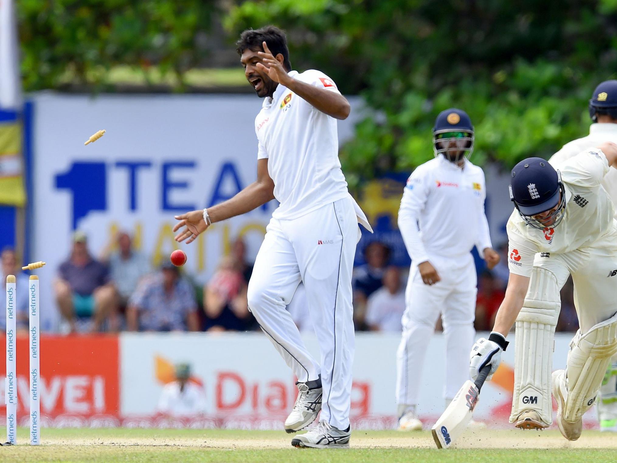 Rory Burns is run out after a direct hit