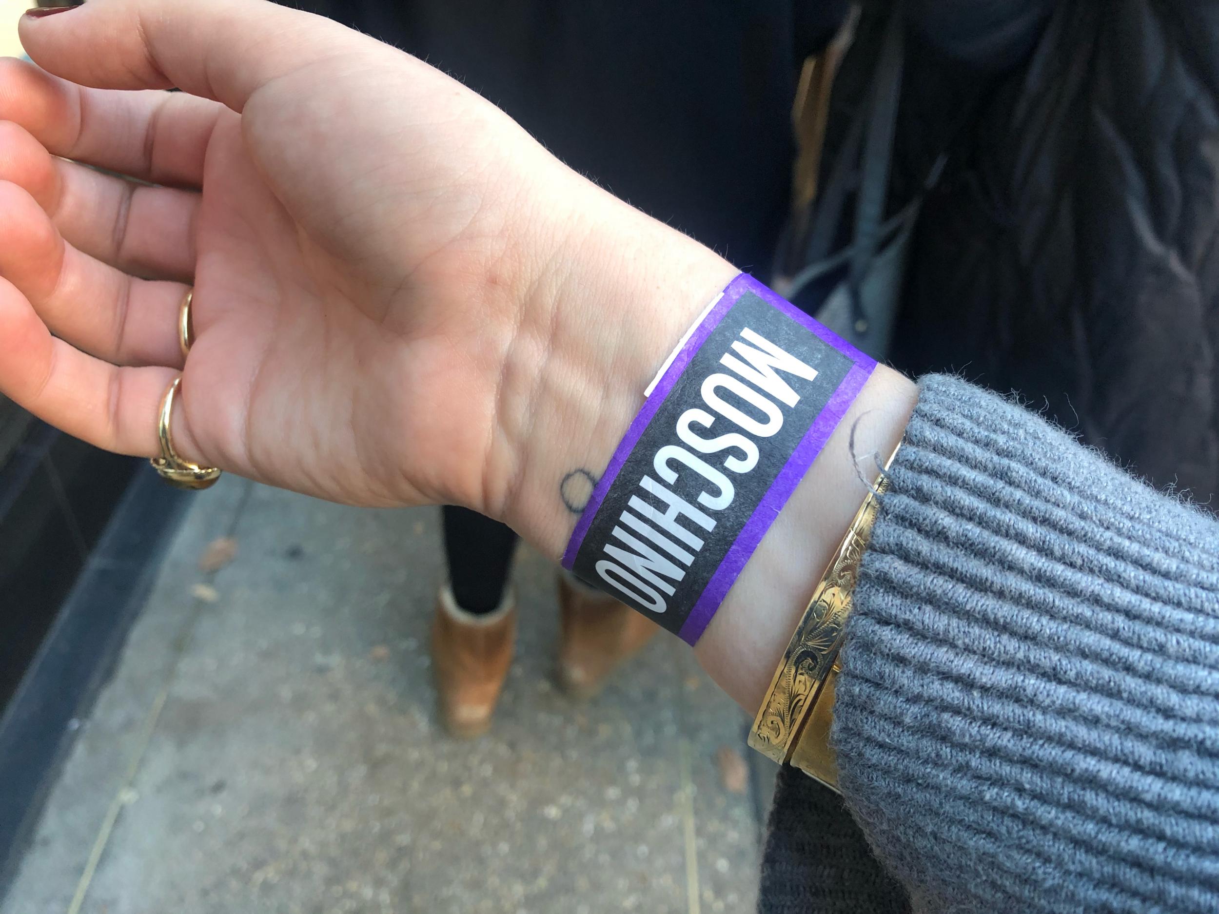 Wristbands were distributed to fans in the queue to give them a specific time slot to enter the shop.