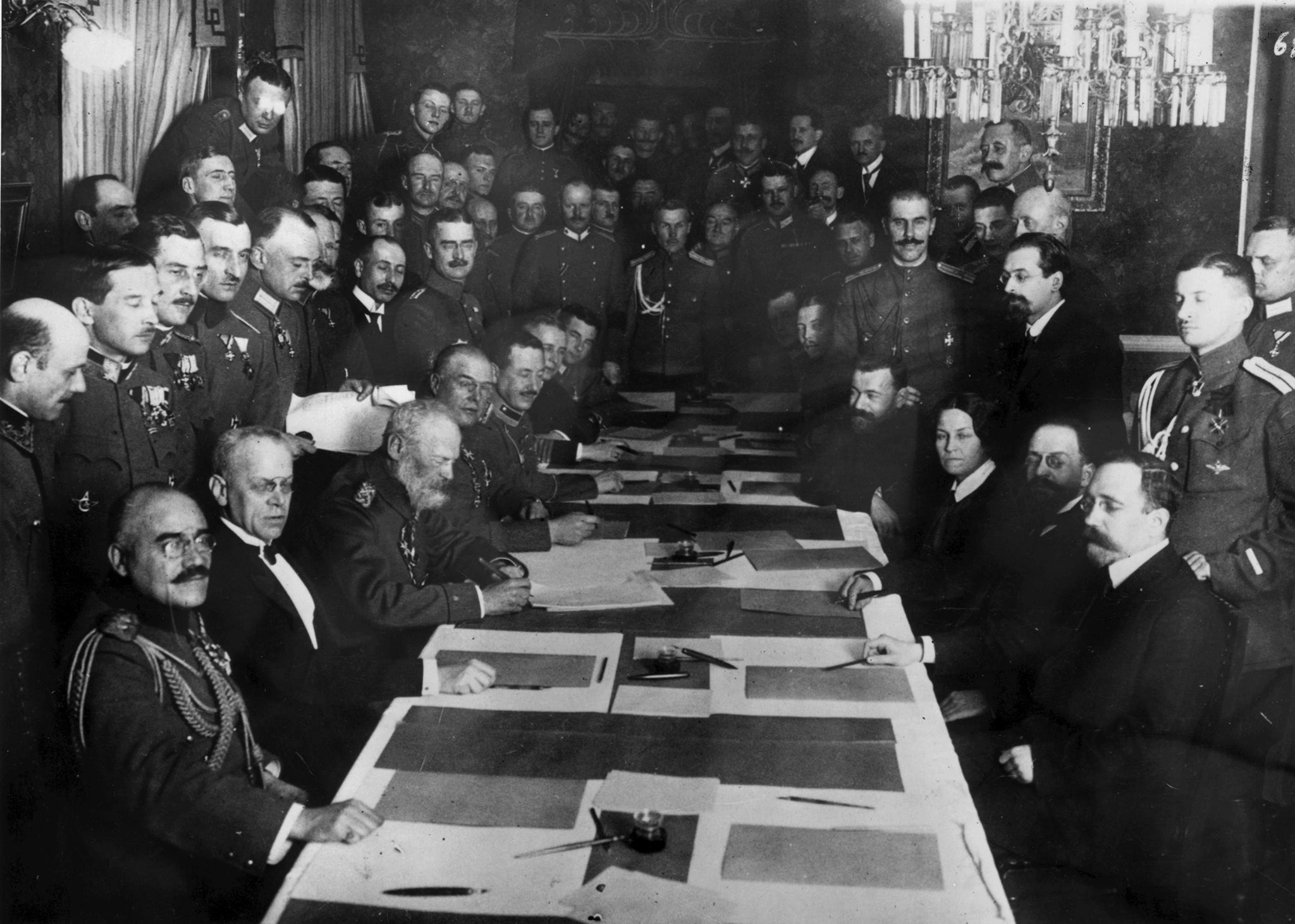 Prince Leopold of Bavaria (sitting, third from left) signs an armistice with the Russians at Brest-Litovsk on 3 March 1918