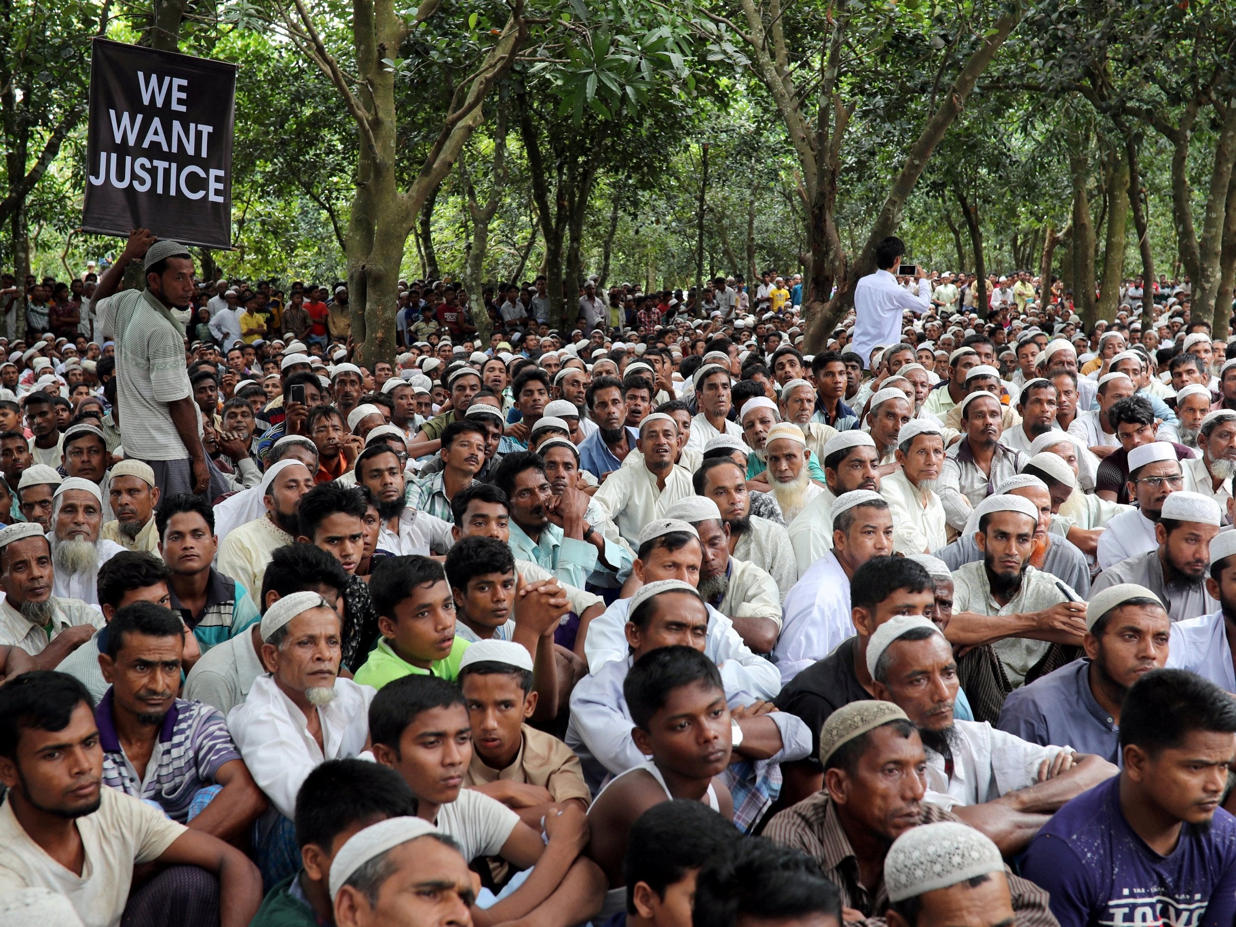 Rohingya refugees take part in a protest marking the one year anniversary of their exodus from Myanmar in Cox's Bazar, Bangladesh