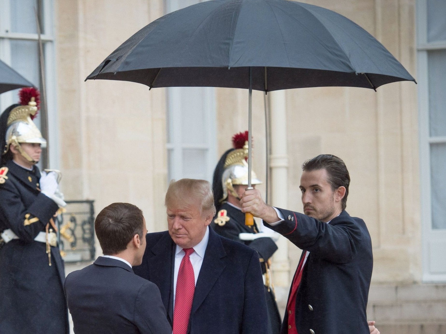 Donald Trump meets French president Emmanuel Macron in Paris.