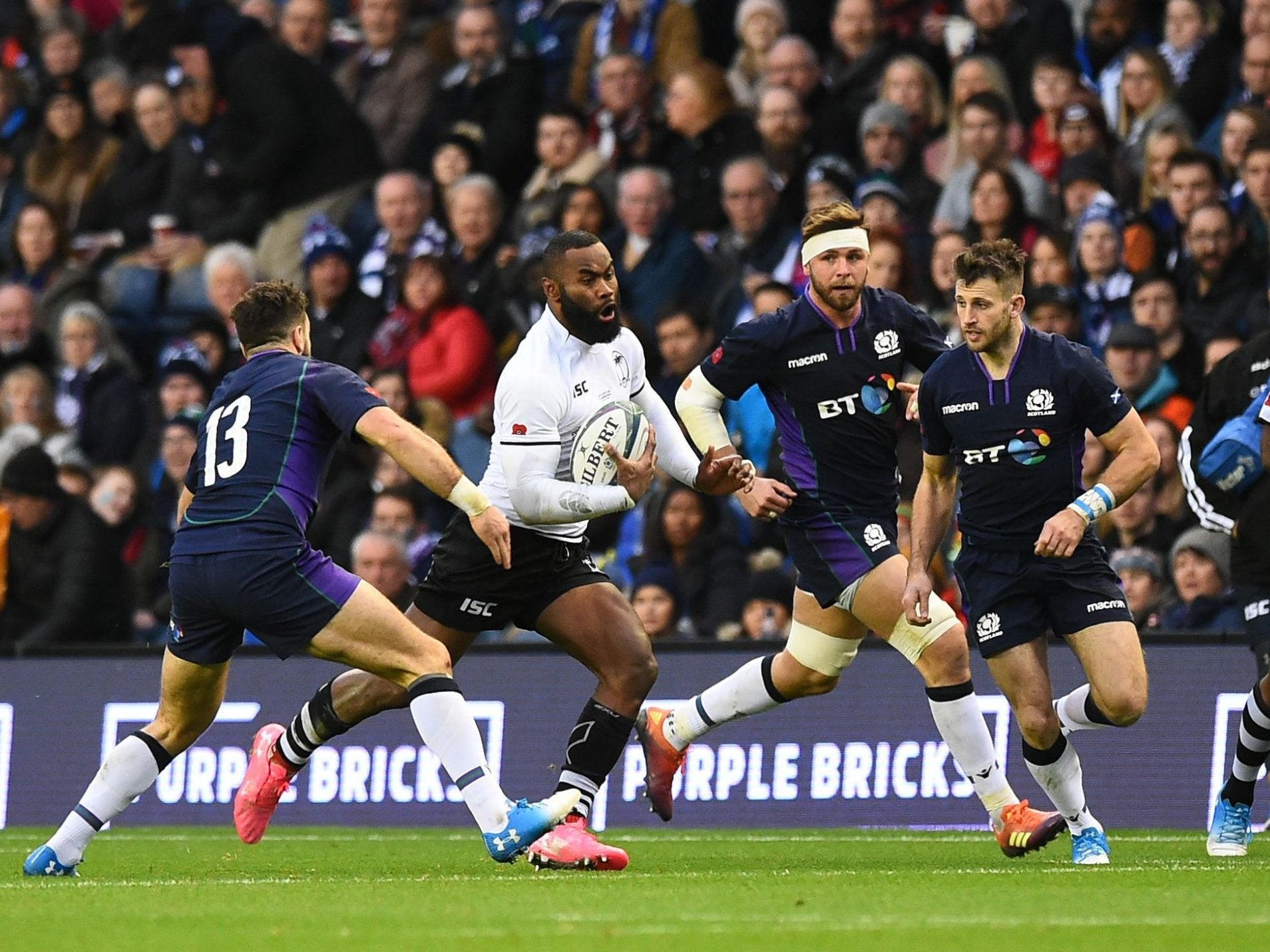 Fiji centre Semi Radradra runs at the Scottish defence