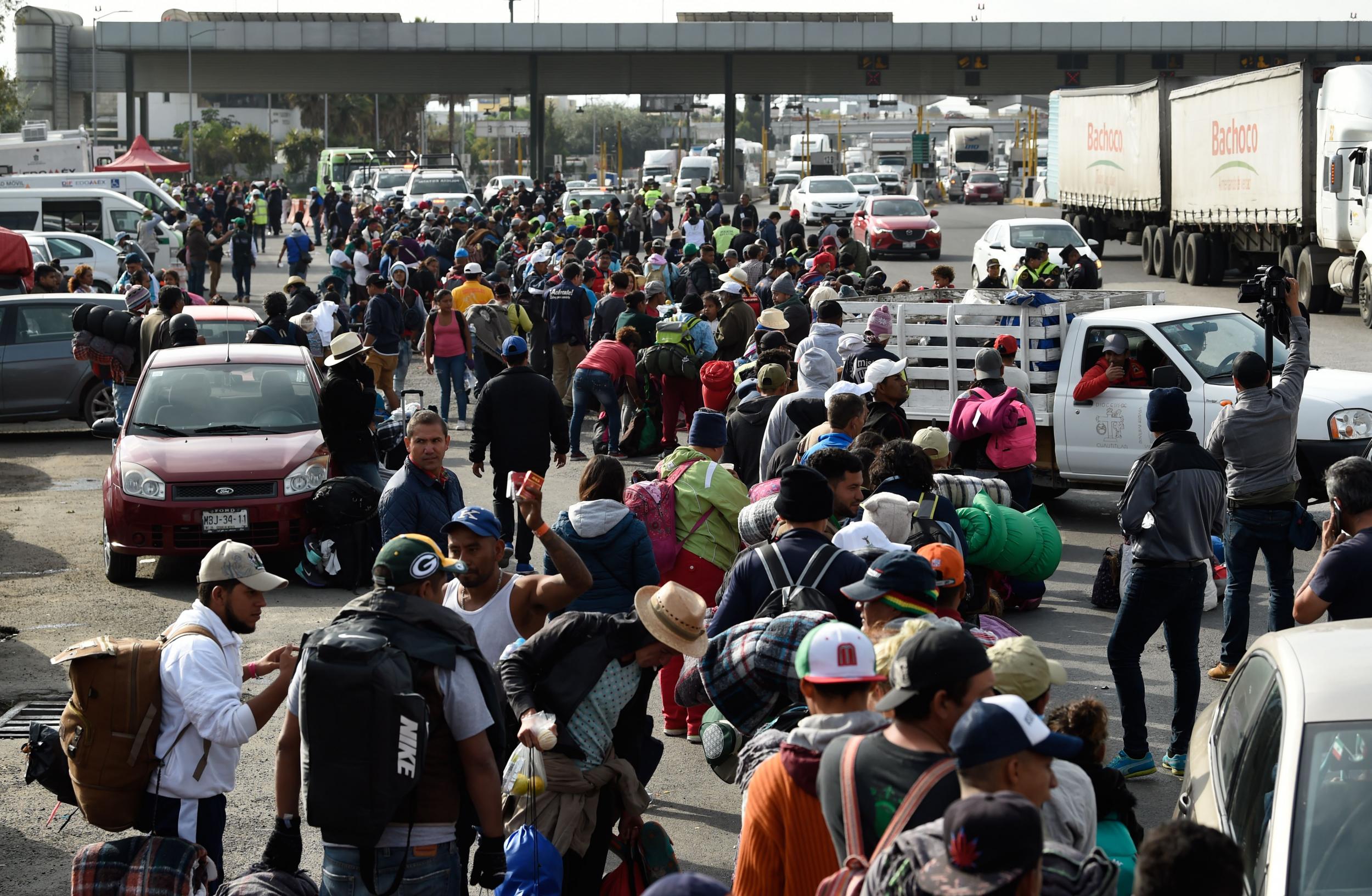 Some of the migrants from poor Central American countries -mostly Hondurans- move towards the US in hopes of seeking asylum as Donald Trump issues an order limiting it.