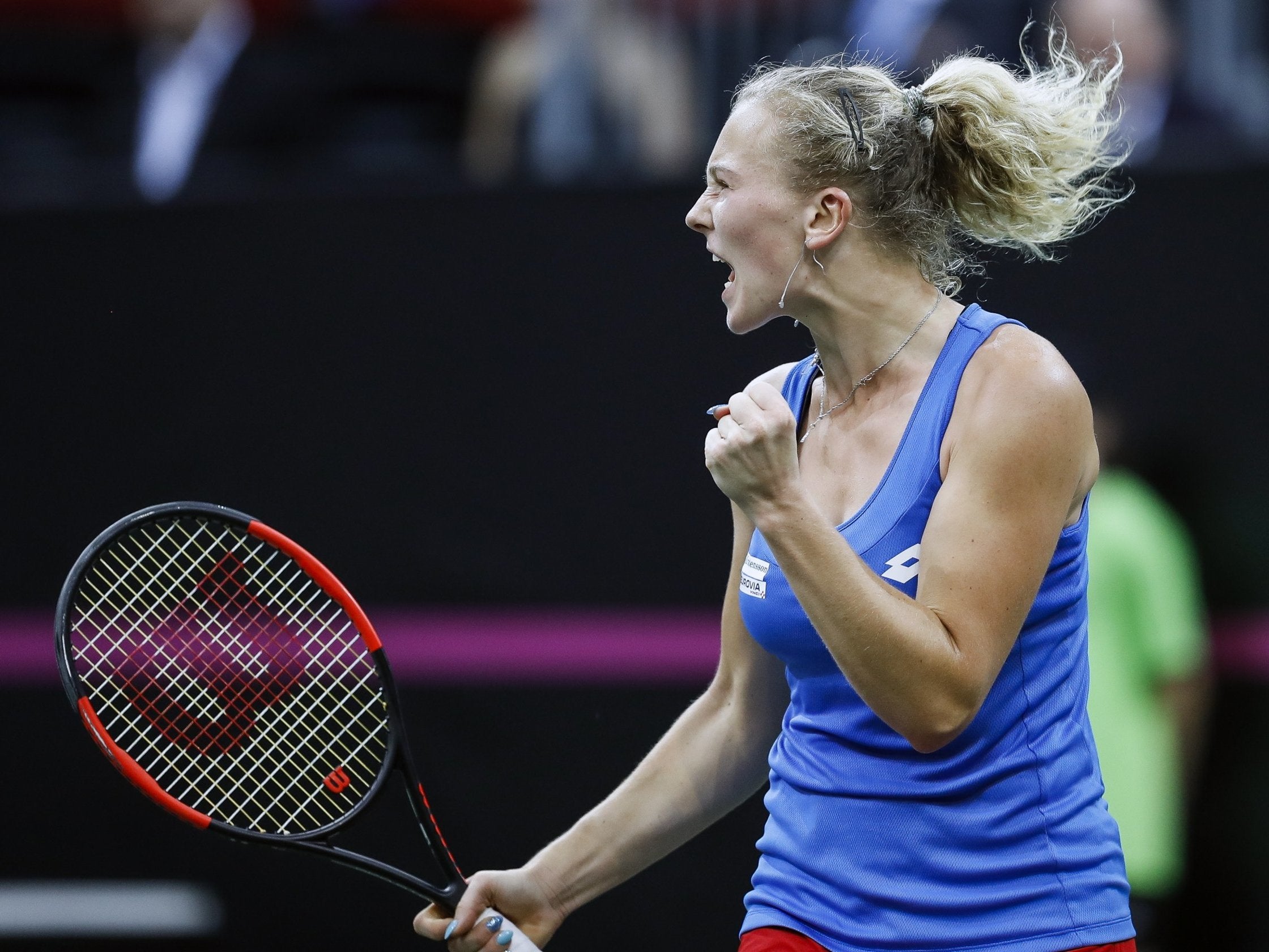 Katerina Siniakova celebrates against Alison Riske