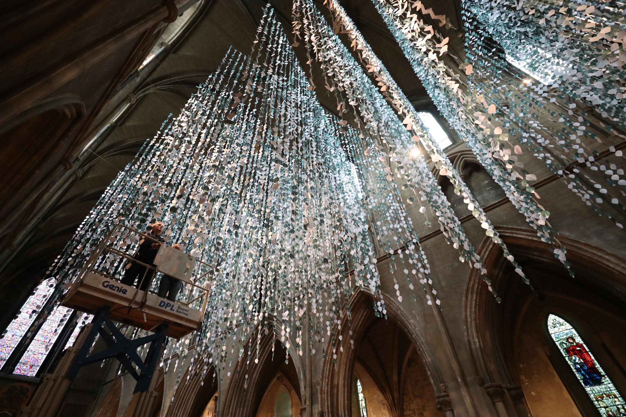 
36,000 leaf-shaped messages are hung from St Patrick’s Cathedral ceiling in Dublin (Niall Carson/PA)