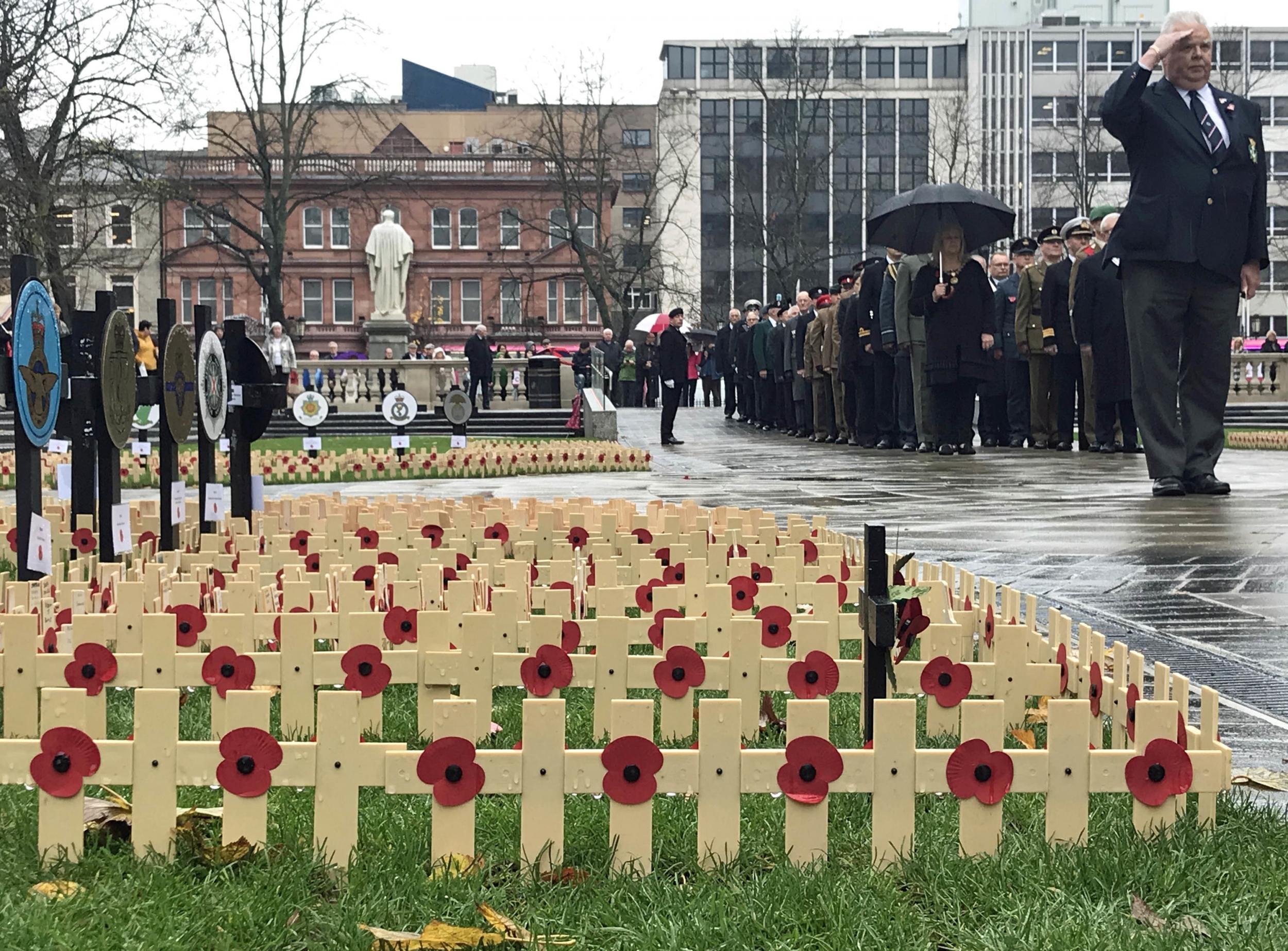 &#13;
Crosses are laid at Belfast City Hall in memory of those killed in the First World War (Rebecca Black/PA)&#13;