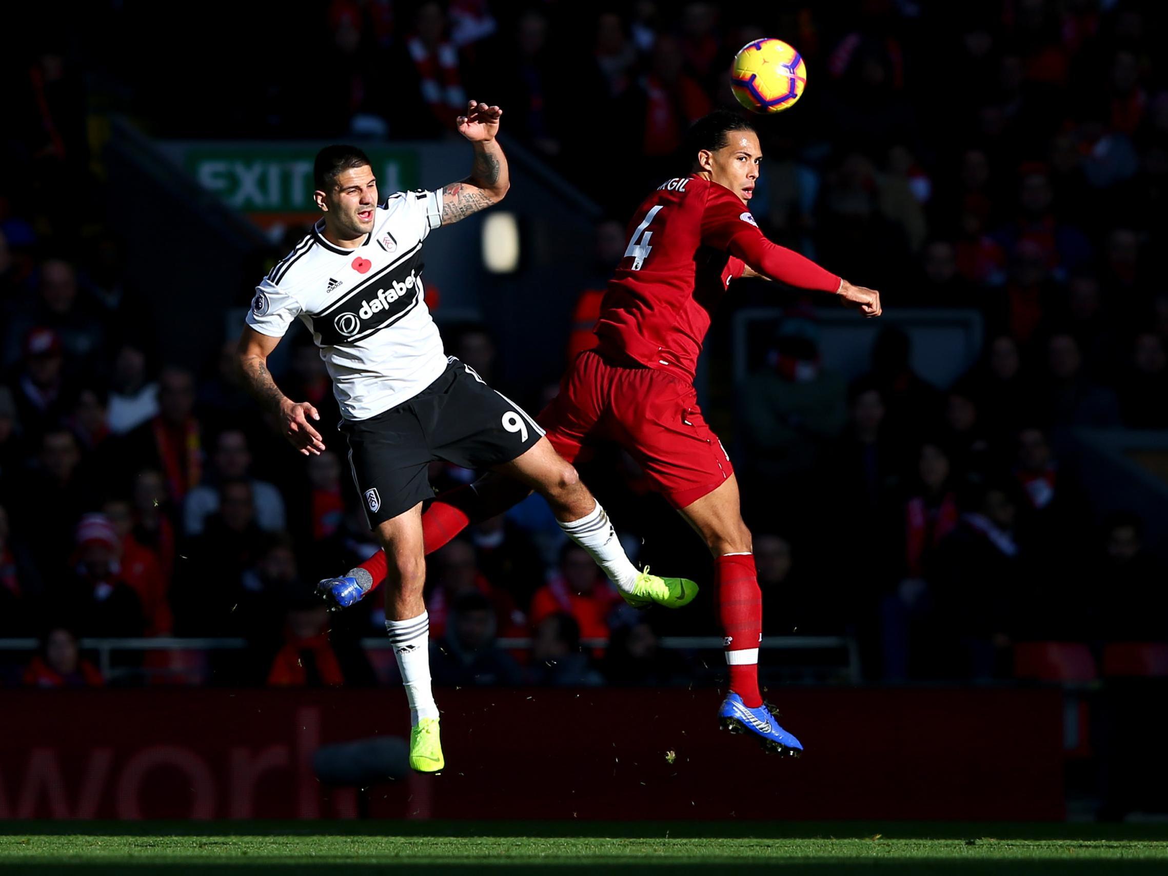 Van Dijk competes for a high ball against Mitrovic