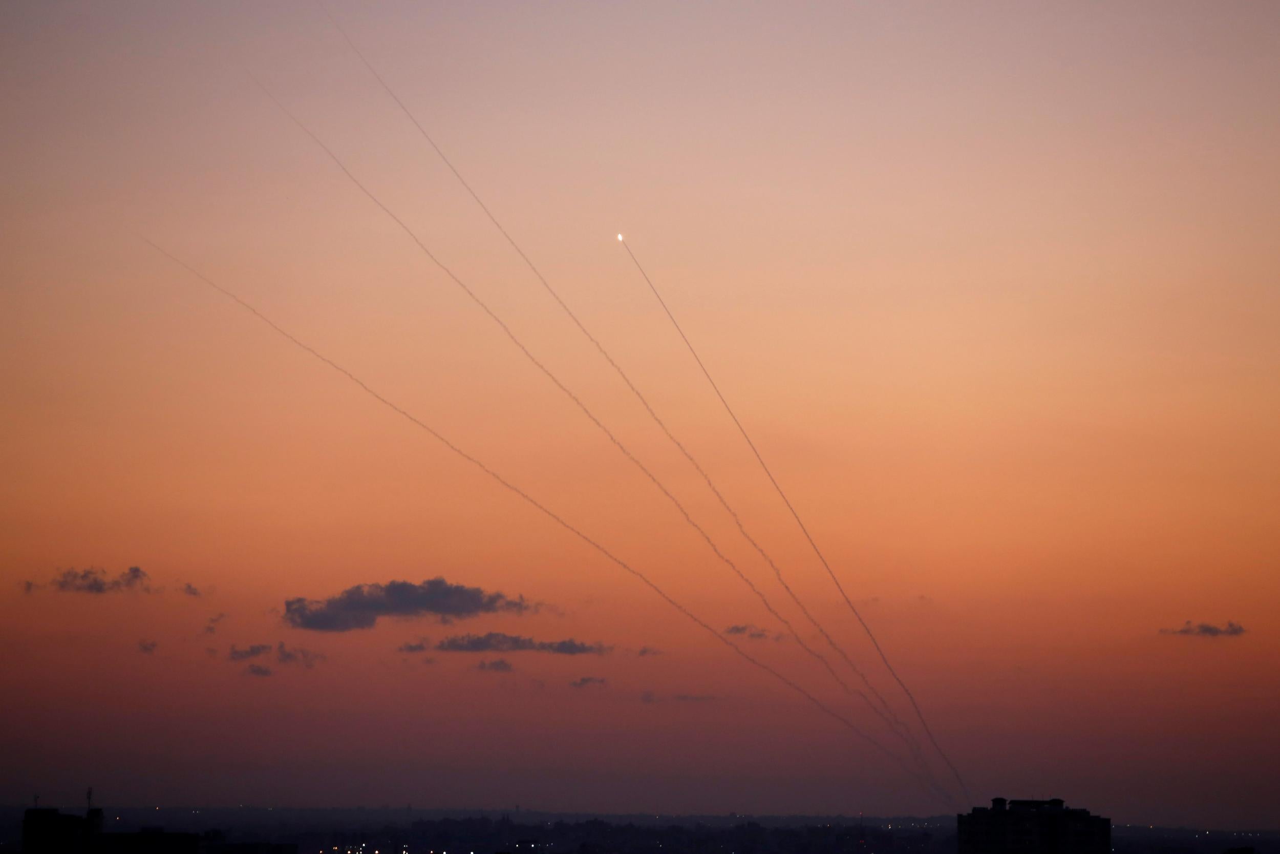 Rockets fired by Palestinian militants towards Israel are seen in Gaza