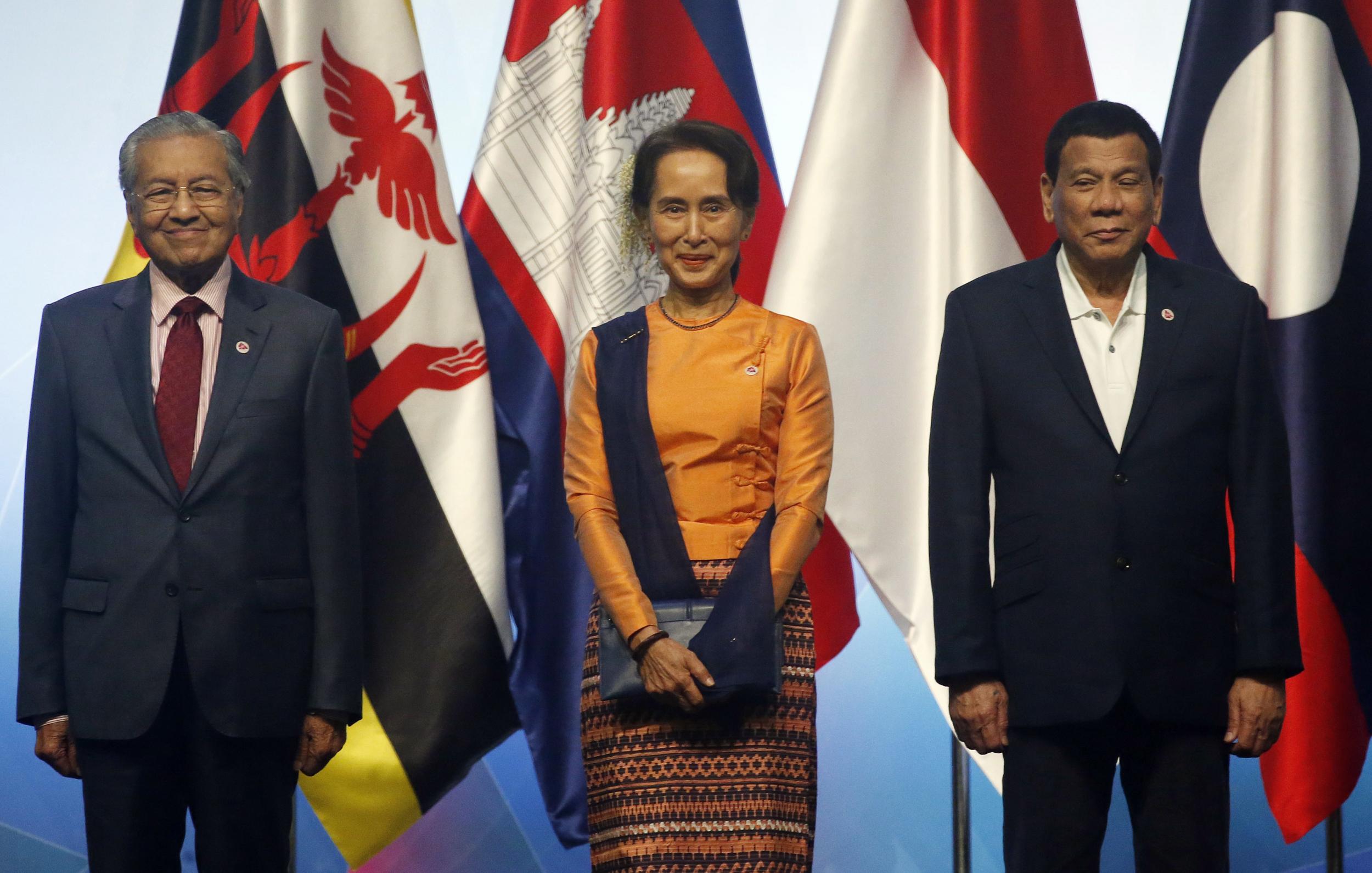 From left: Malaysian PM Mahathir Mohamad, Myanmar leader Aung San Suu Kyi and Philippine President Rodrigo Duterte at the opening ceremony of the 33rd ASEAN Summit and Related Summits in Singapore on Tuesday 13 November 2018. (Bullit Marquez/