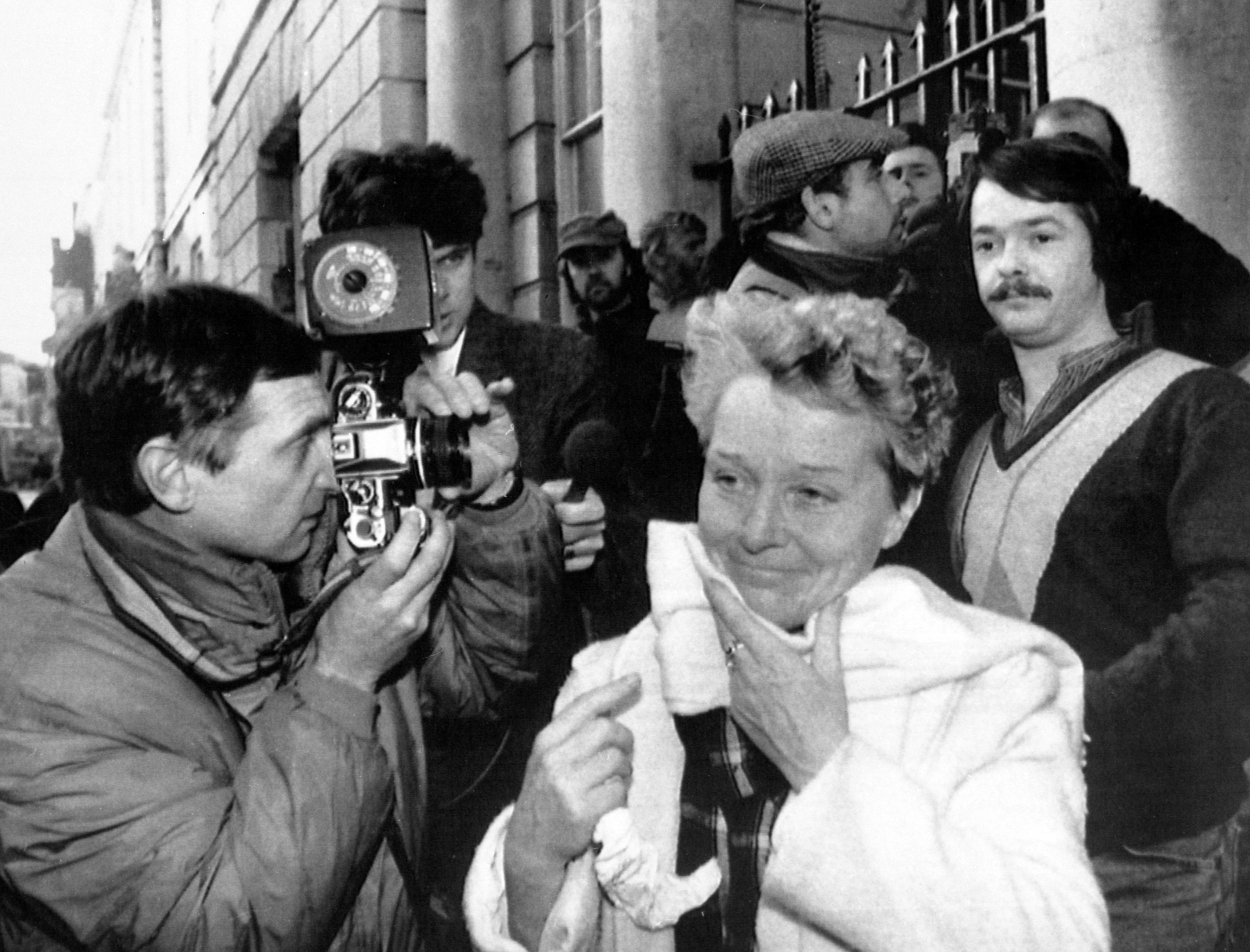 Sylvia Bishop leaves Lewes Crown Court followed by her son Alec (with moustache) after the December 1987 acquittal