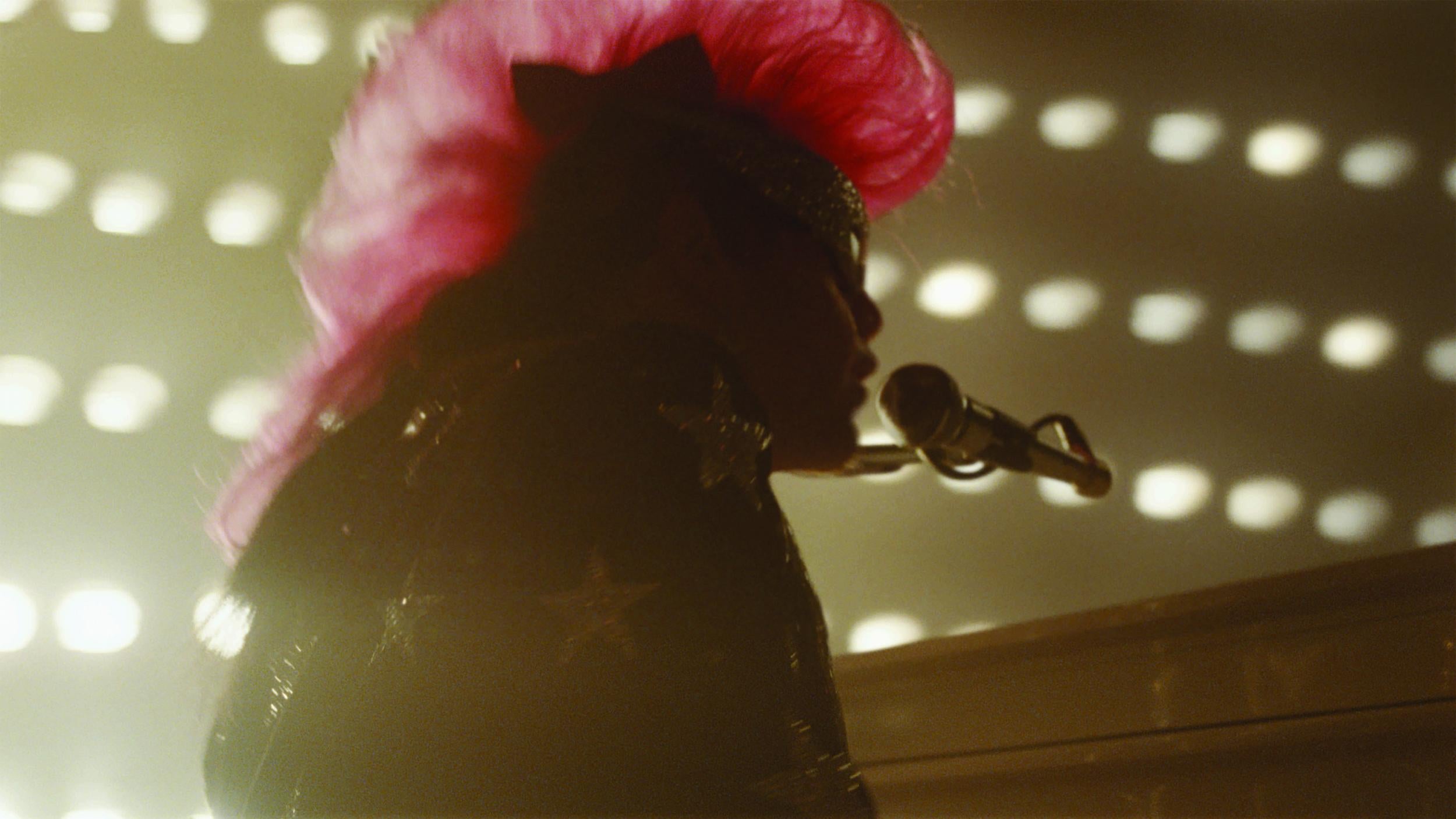 A pink mohawk and a sequin jacket: the advert celebrates the singer's iconic costumes