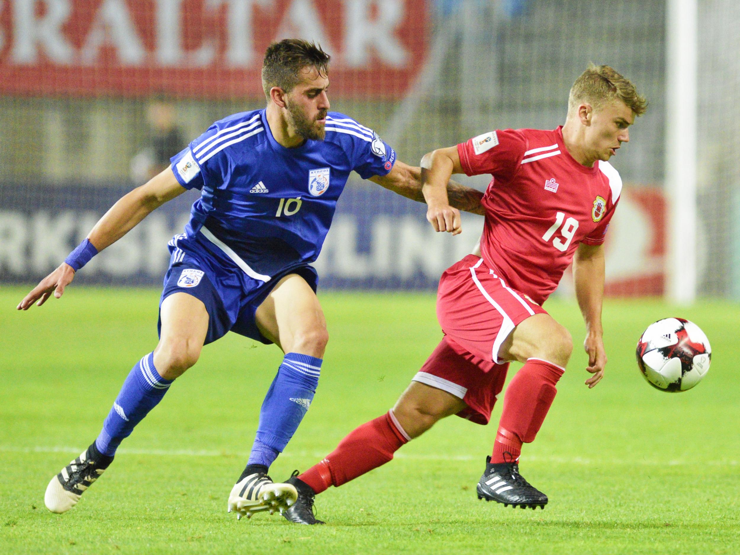 Coomes playing for Gibraltar against Cyprus