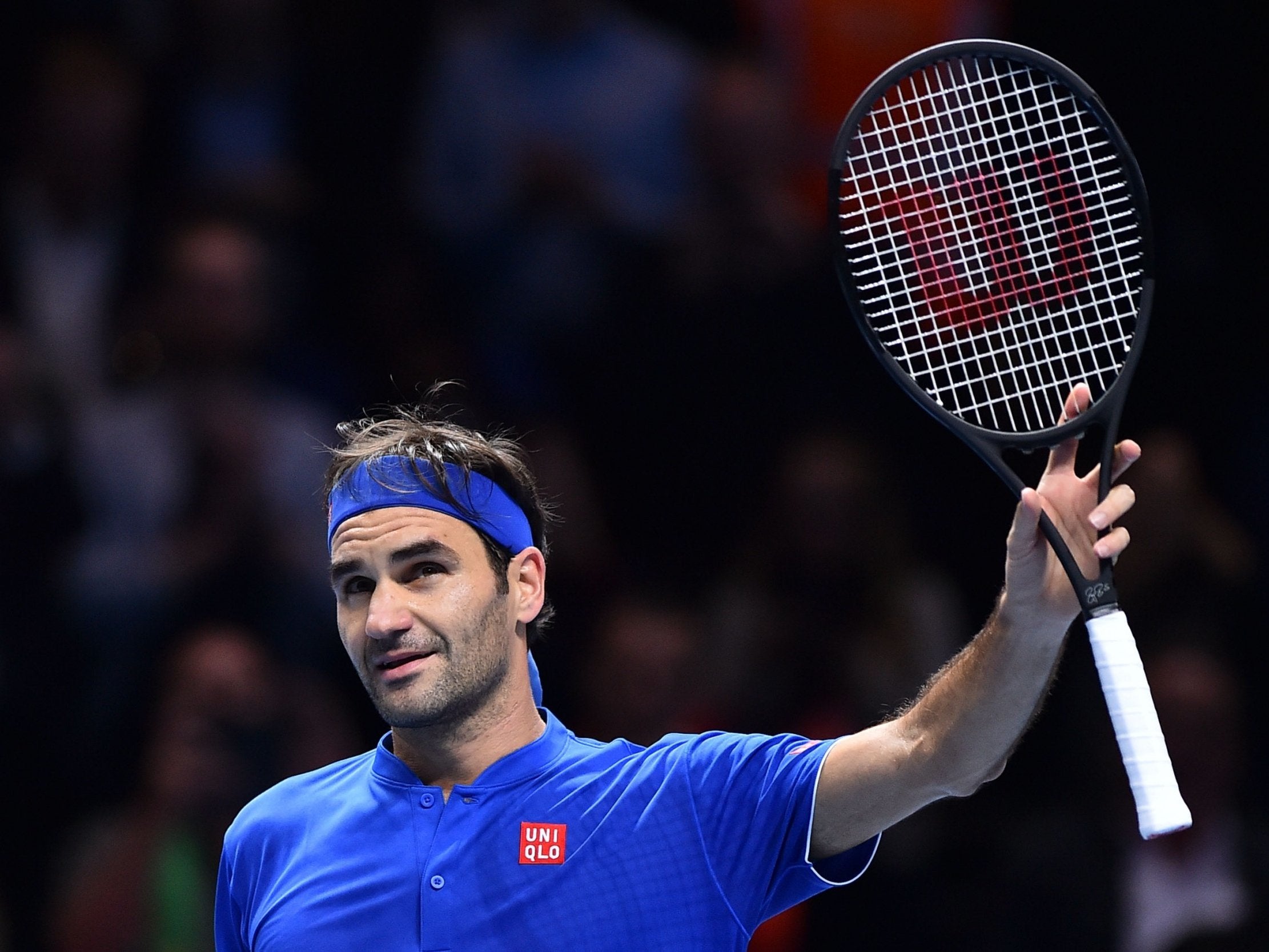 Roger Federer salutes the crowd after his victory