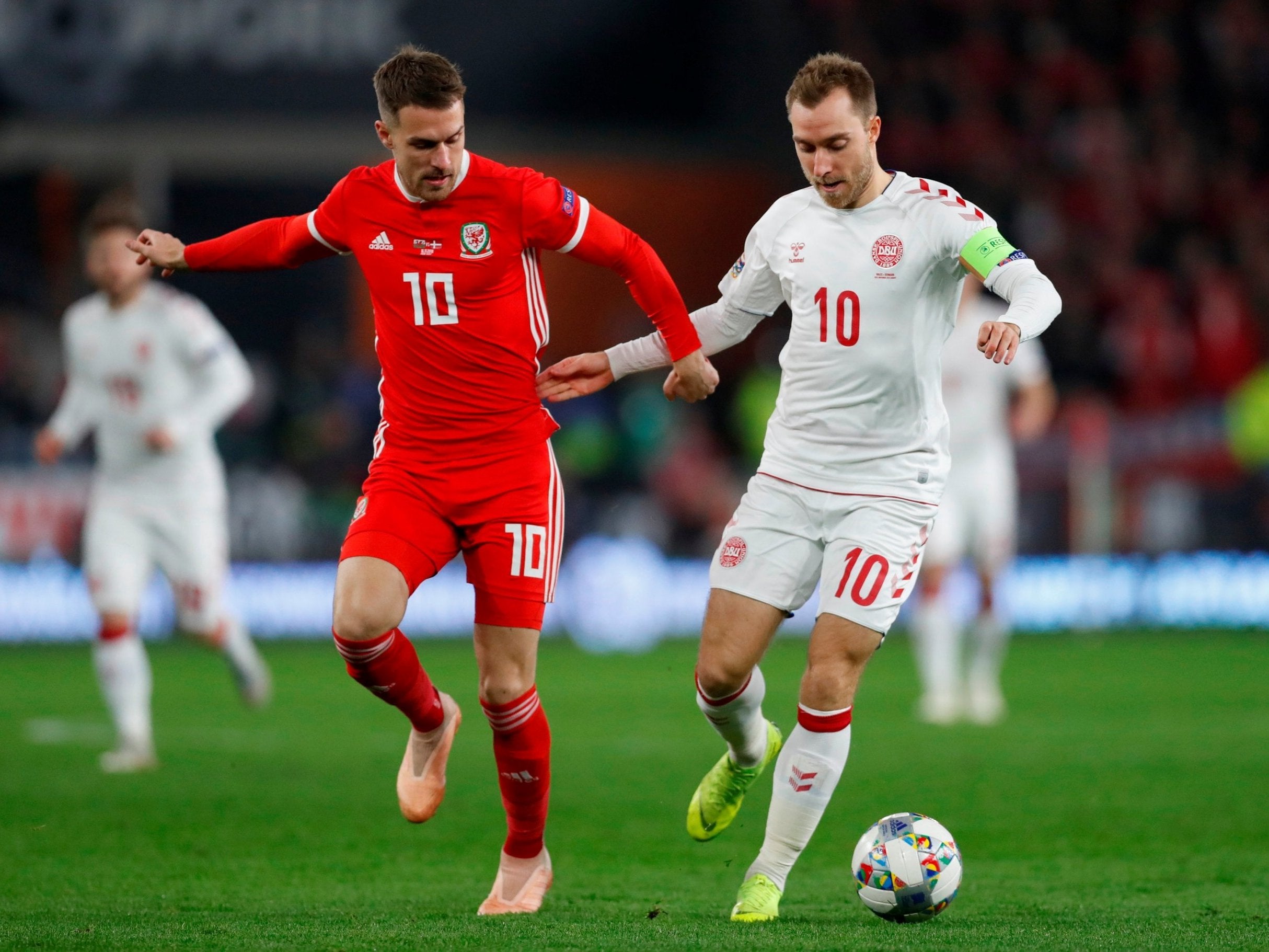 Aaron Ramsey chases down Christian Eriksen