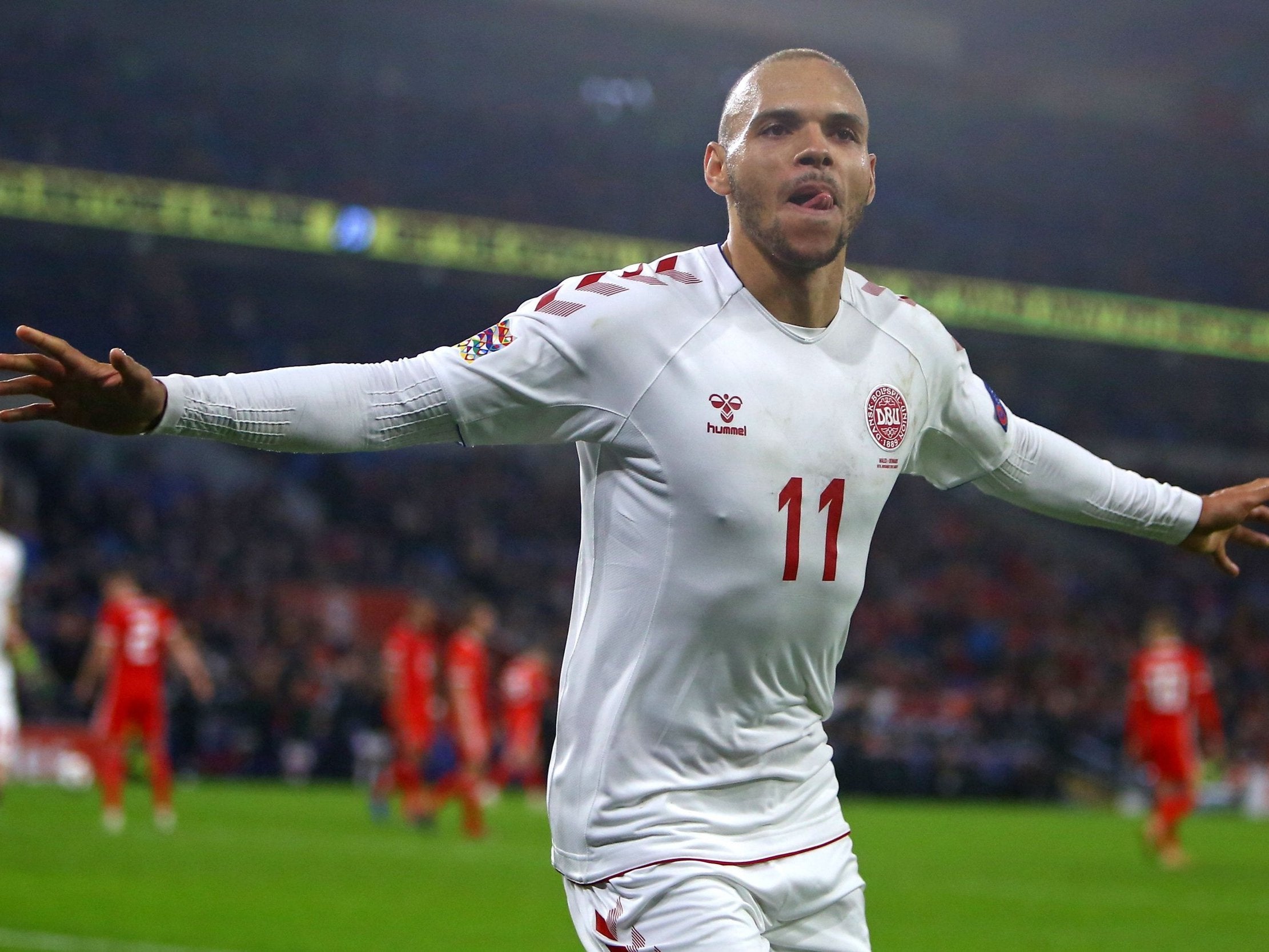 Martin Braithwaite celebrates after scoring Denmark's second in style