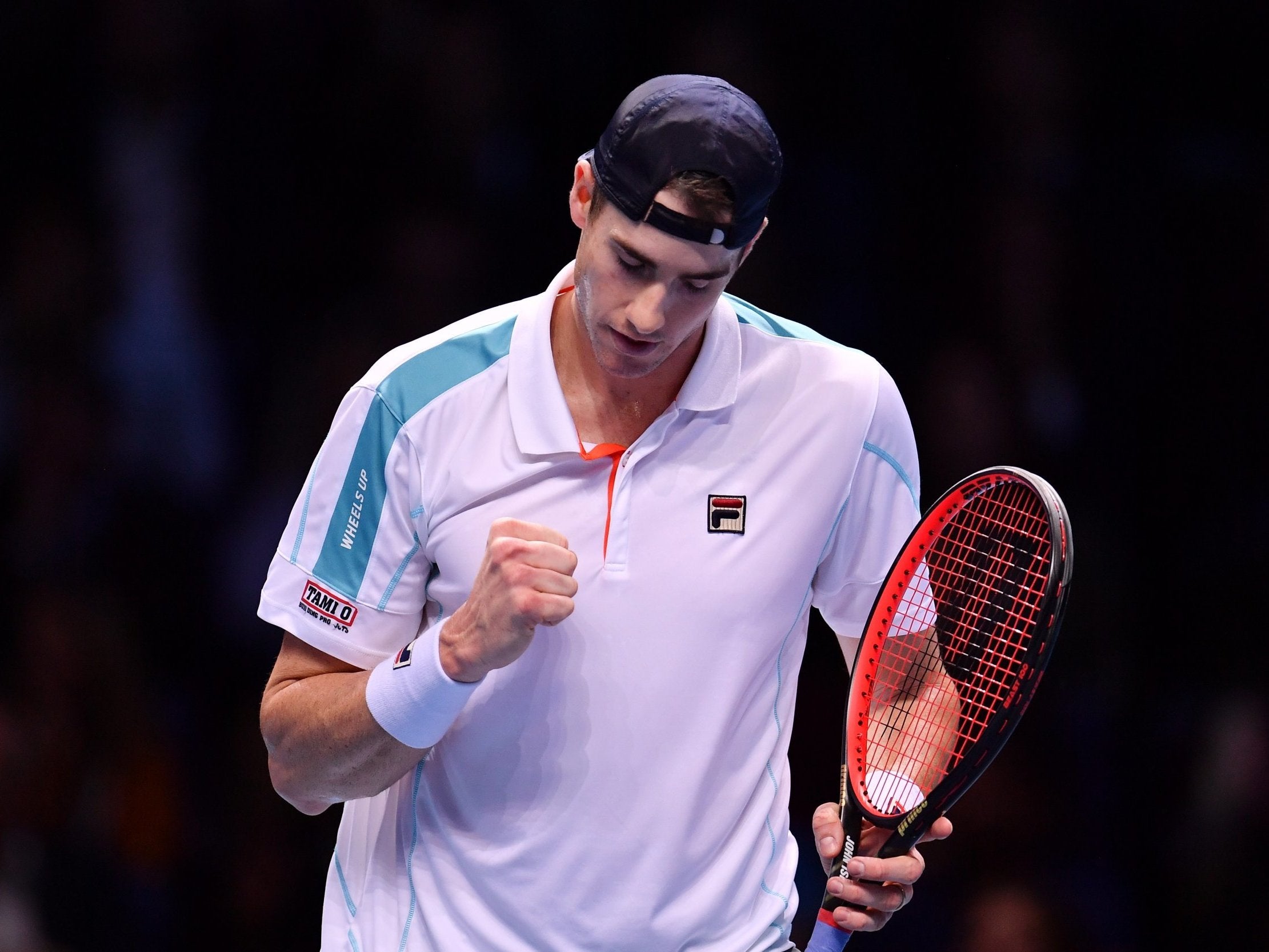 John Isner in action against Alexander Zverev