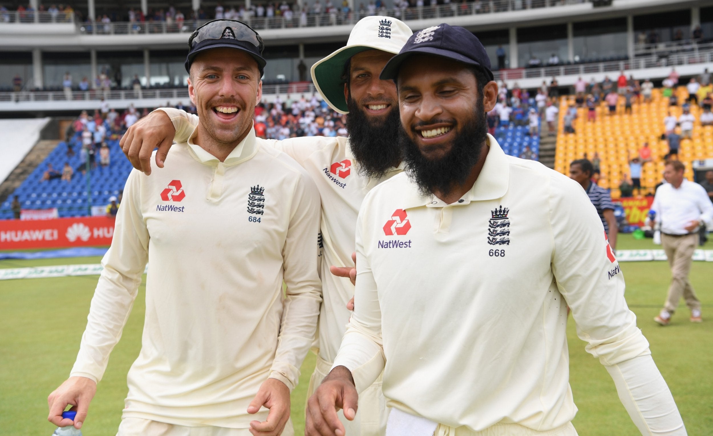 Jack Leach, Moeen Ali and Adil Rashid celebrate victory in Sri Lanka