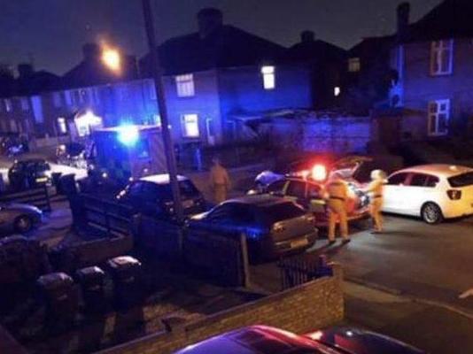 Police and paramedics attend the scene in Fraser Road, Edmonton