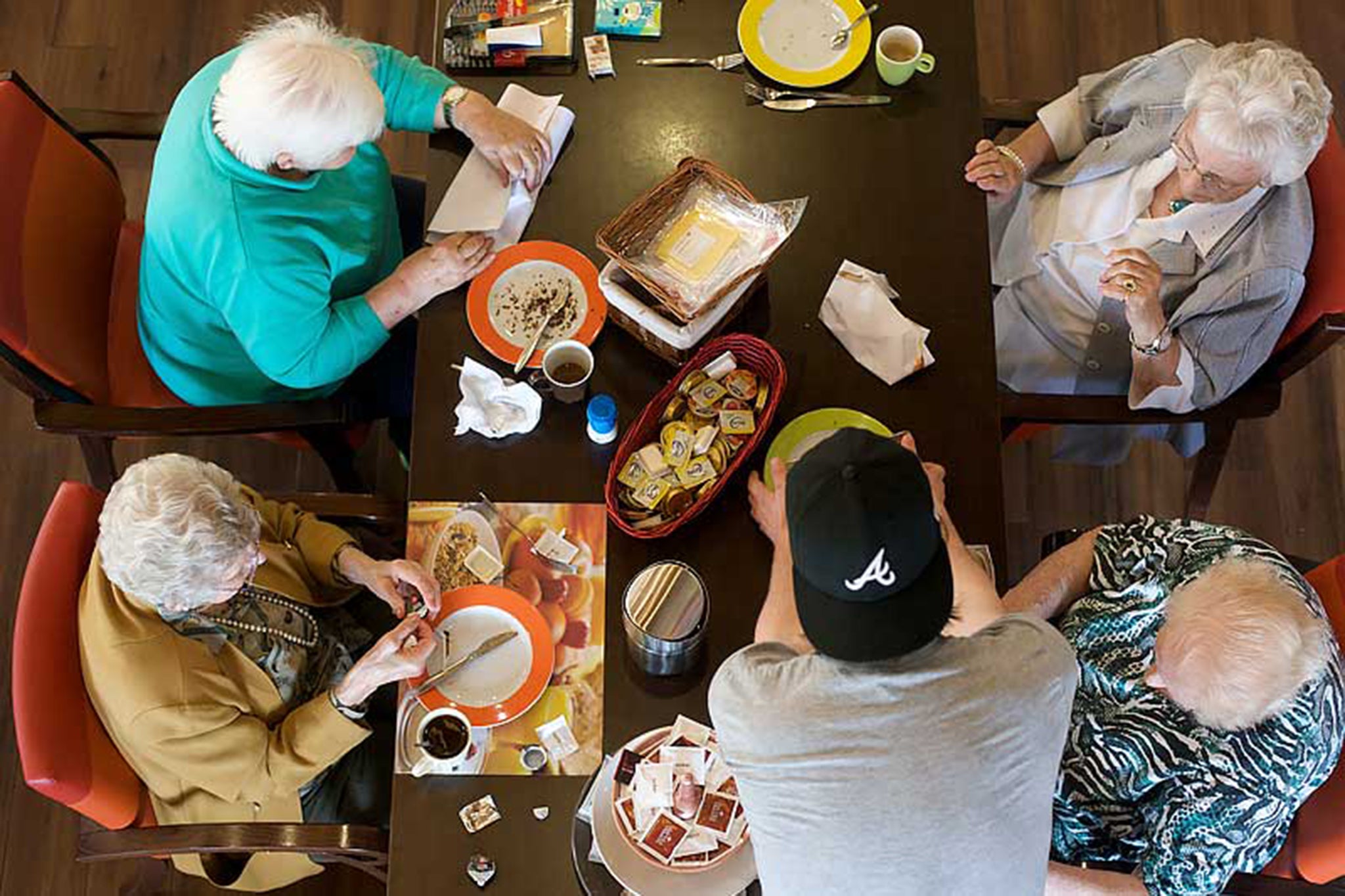 The students host an evening meal for the residents in the restaurant each day of the week