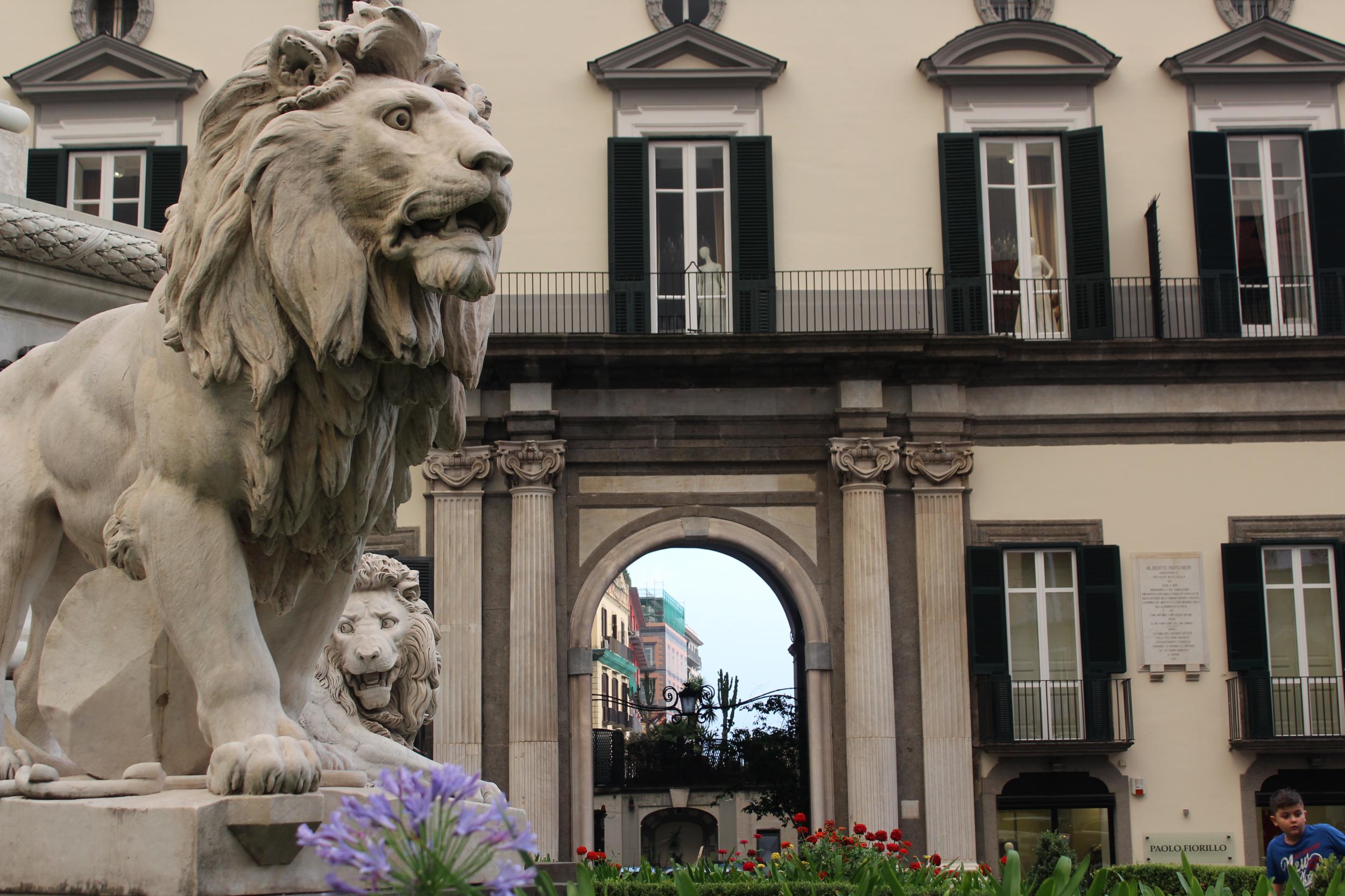 The lions in Piazza dei Martiri where Lila opens her shoe salon