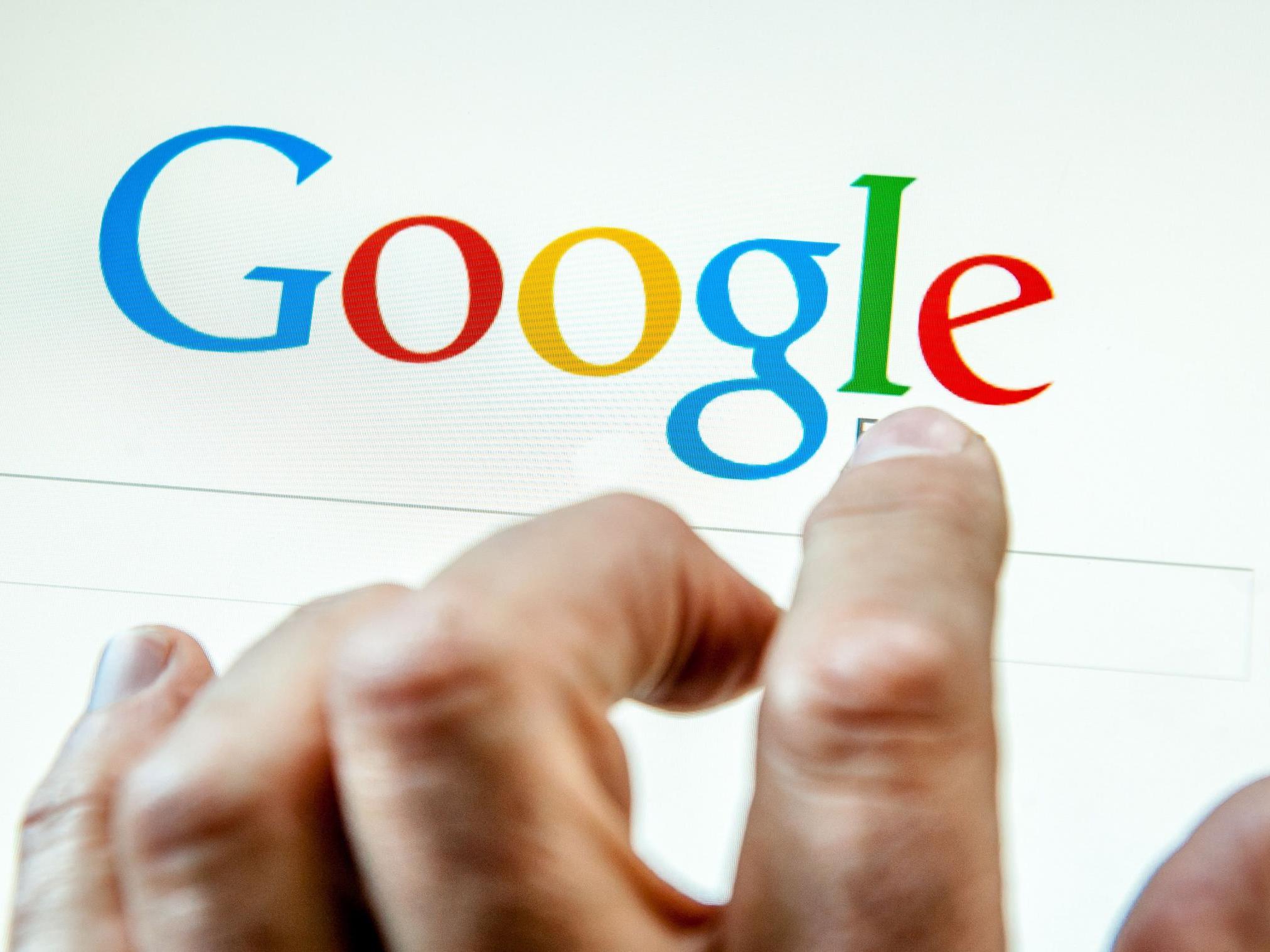 A person prepares to search the internet using the Google search engine (Philippe Huguen /