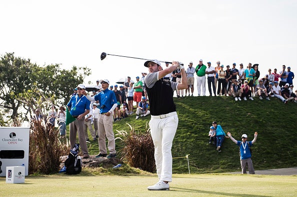 Tarren tees off at Clearwater Bay in Hong Kong