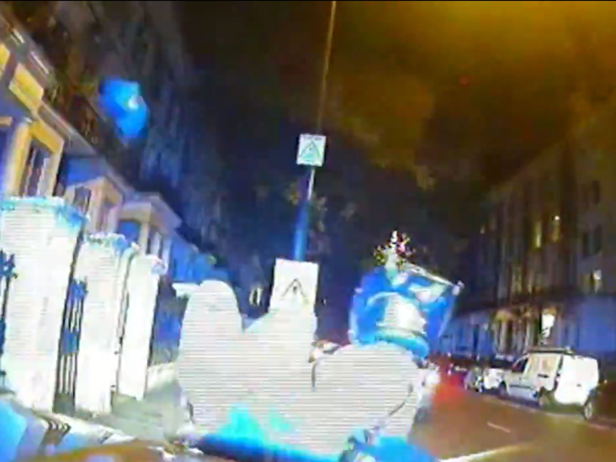 A still from footage showing a Metropolitan Police car in ‘tactical contact’ with a moped rider (Photos Metropolitan Police)