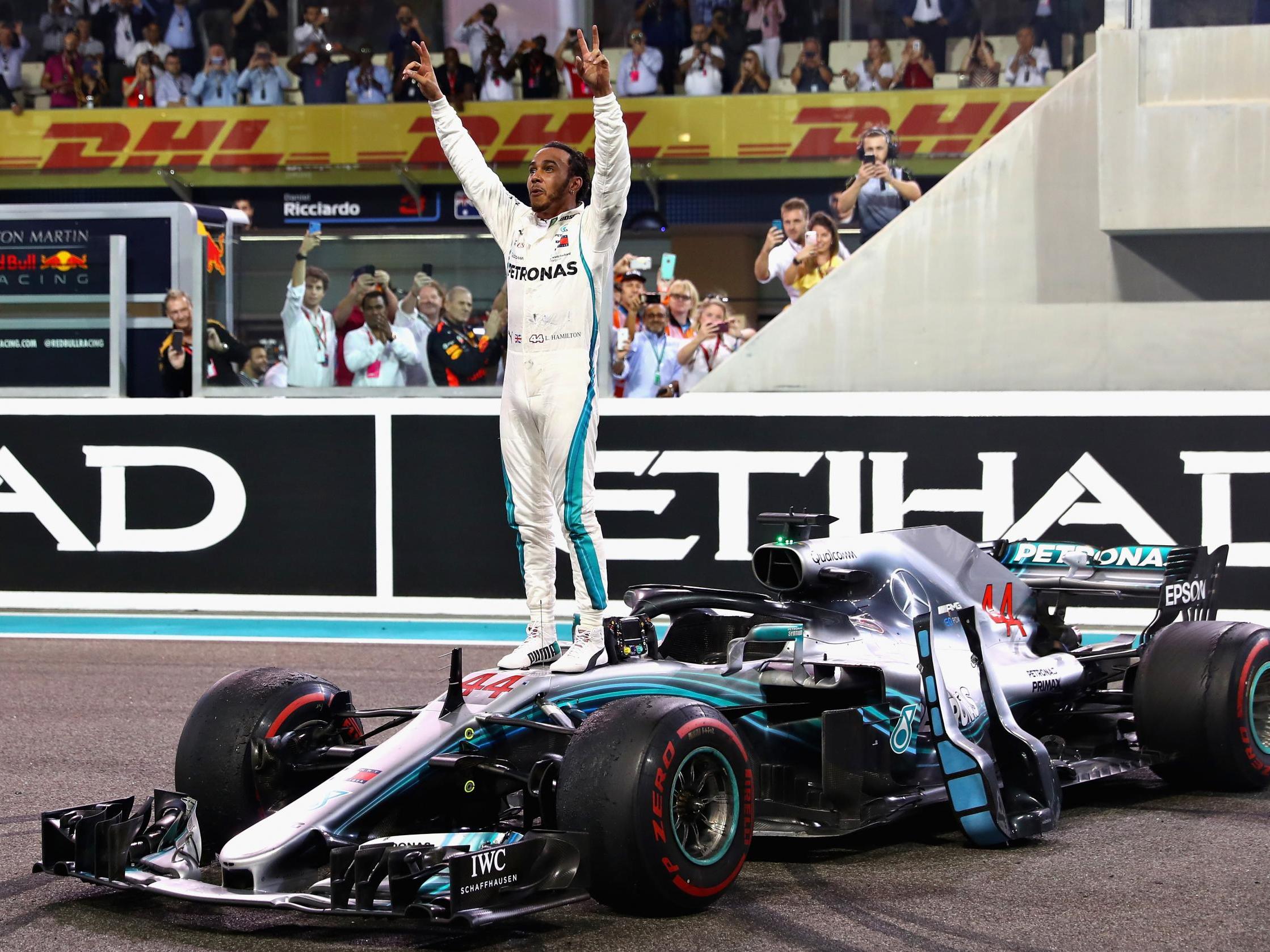 The world champion celebrates his final victory of the year